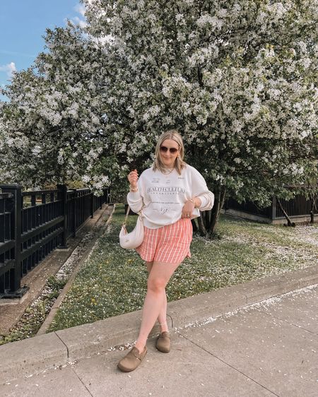 Comfy spring to summer midsize outfit - graphic sweatshirt (sized up to XXL for an oversized fit), pink linen striped boxer shorts (tts, wearing L), Amazon Birkenstock inspired clogs, Coach shoulder bag


#LTKcanada #LTKsummer #LTKmidsize