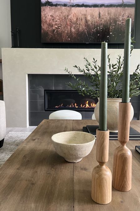 Organic and neutral coffee table decor. I’m always adding the warmth of wood wherever I can..these candle holders are a nice wood tone and pretty organic shape. 
Home decor inspiration 

#LTKhome