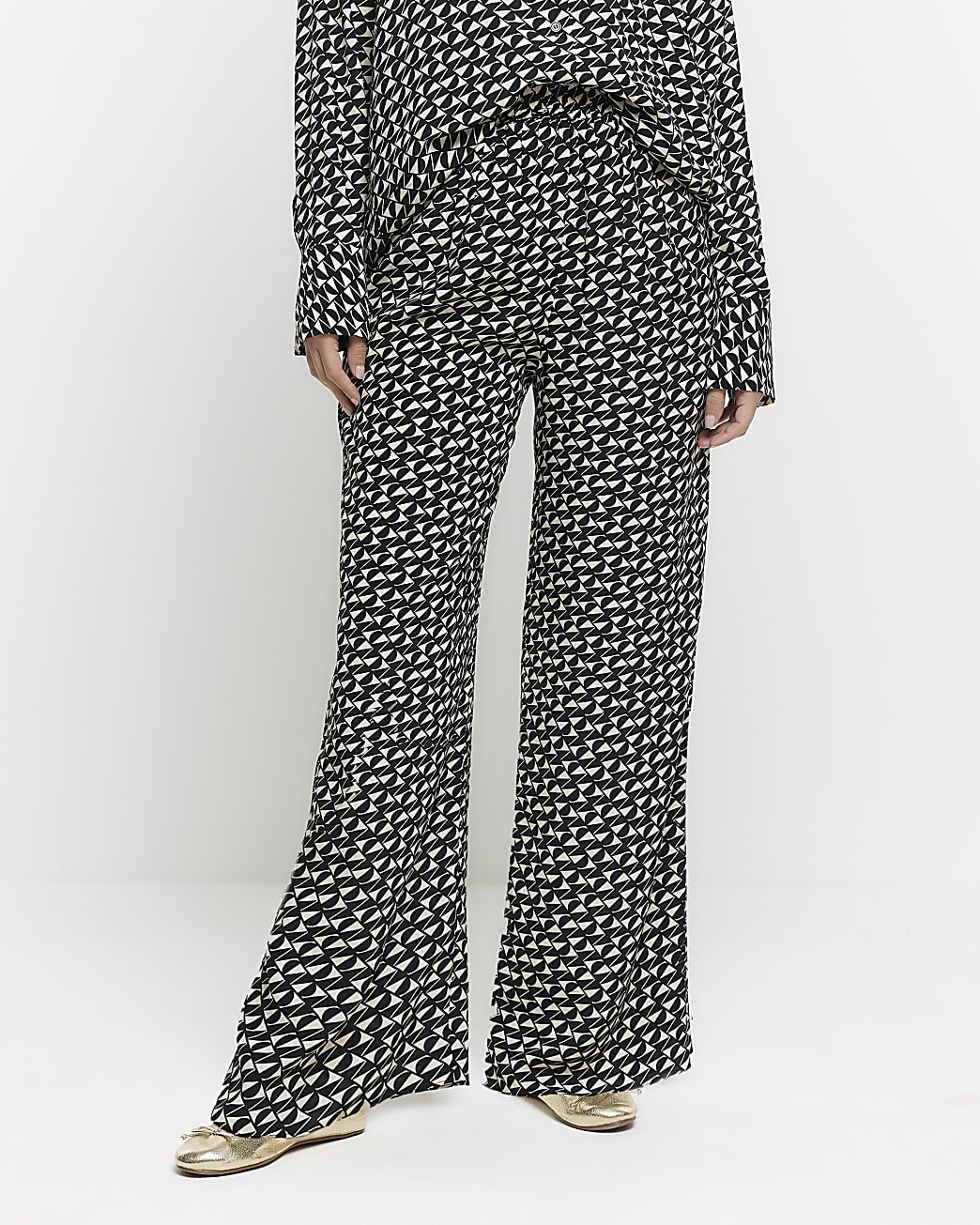 Black satin geometric wide leg trousers | River Island (UK & IE)