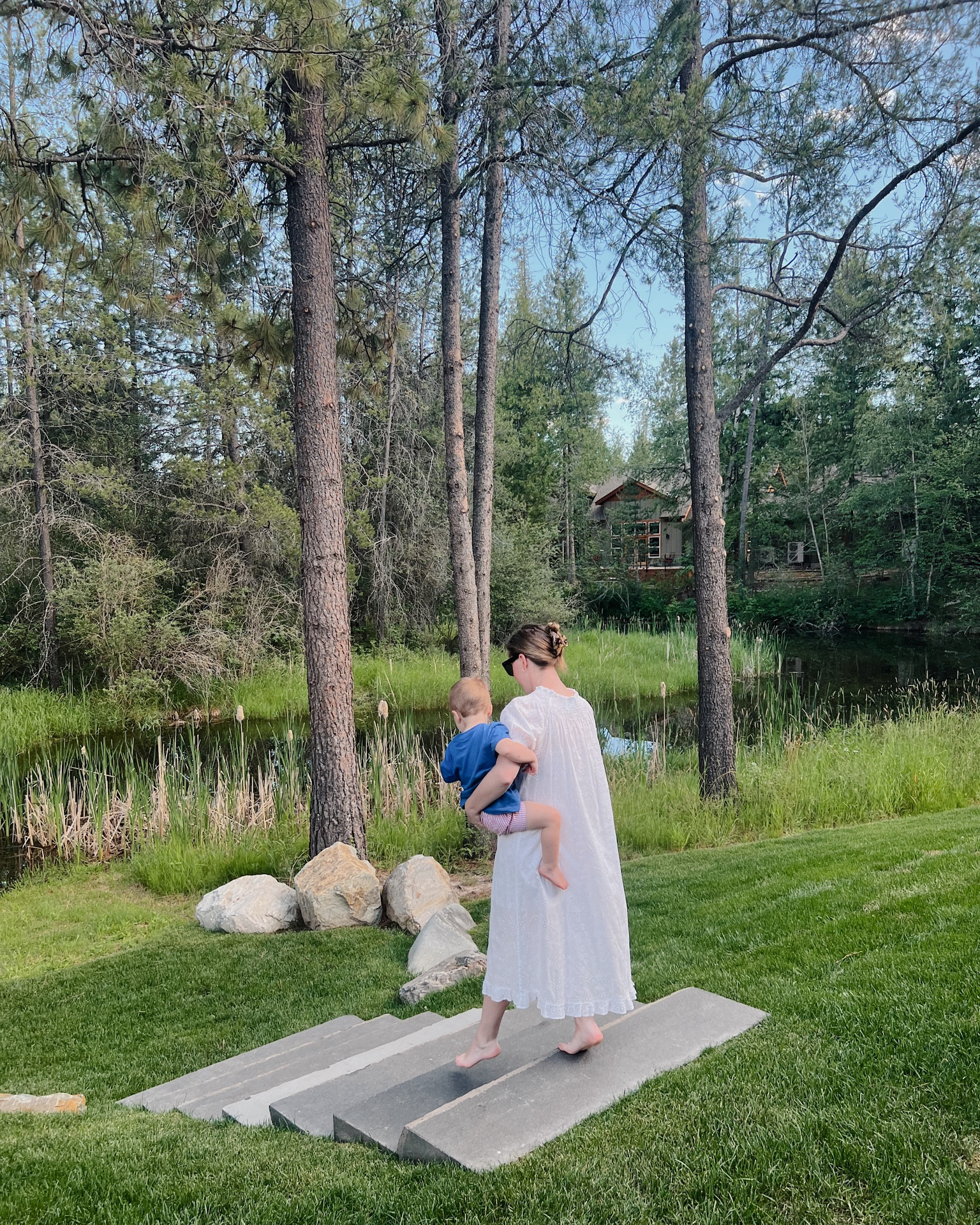 Ashley Butterfield of SideSmile Style wears a white eyelet smocked dress perfect for summer vacation. Runs big order a size down.

#LTKSeasonal #LTKKids #LTKSummerSales