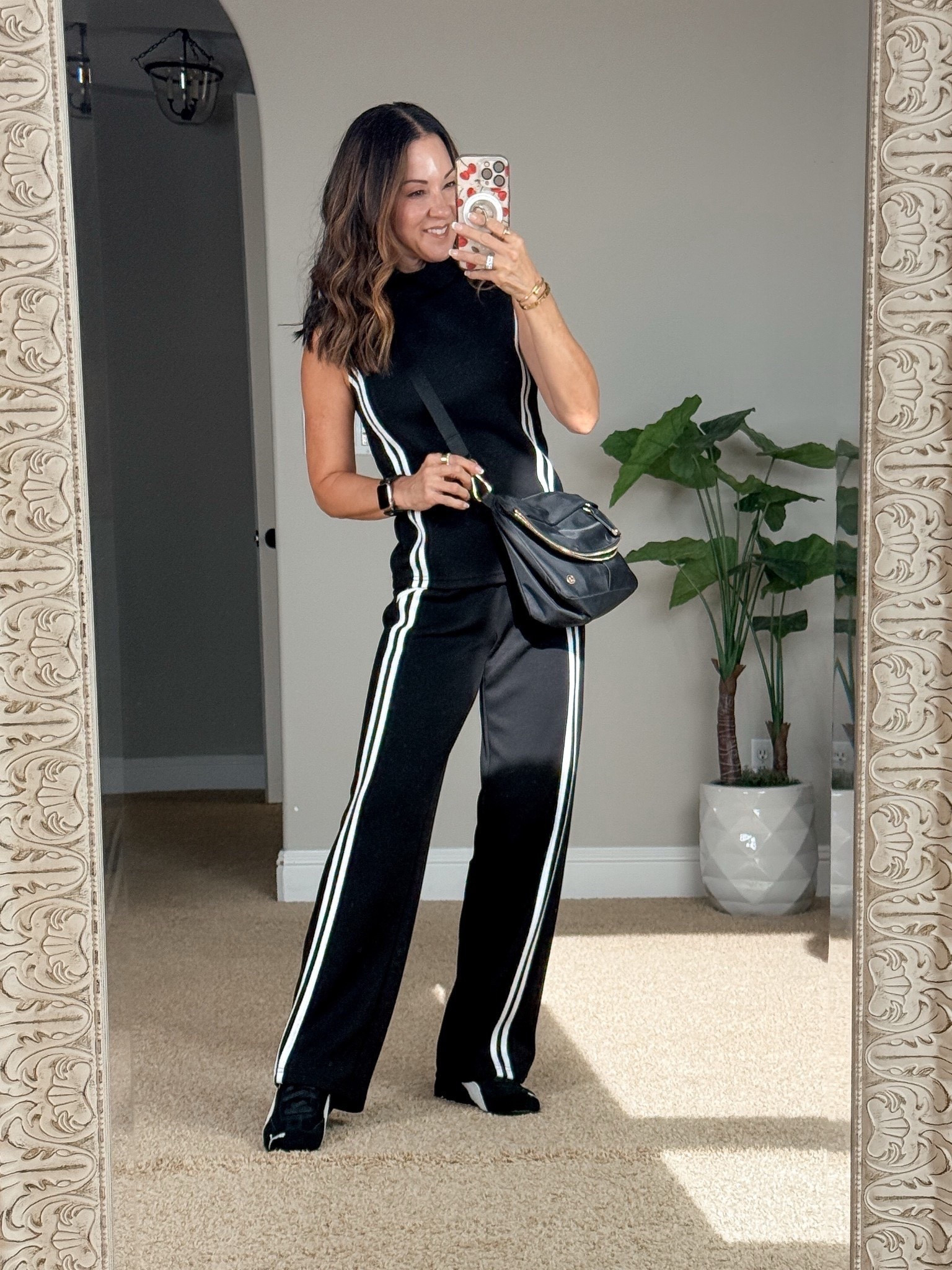 This Amazon 2 piece wide leg pant set is a 10/10! The fabric is incredible lighting soft & doesn’t wrinkle, the cut and stripes are so flattering! Im only 5’1” so I fold over the waistband for the perfect length. Size XS in black. Sneakers TTS 

#LTKPetite #LTKStyleTip #LTKActive