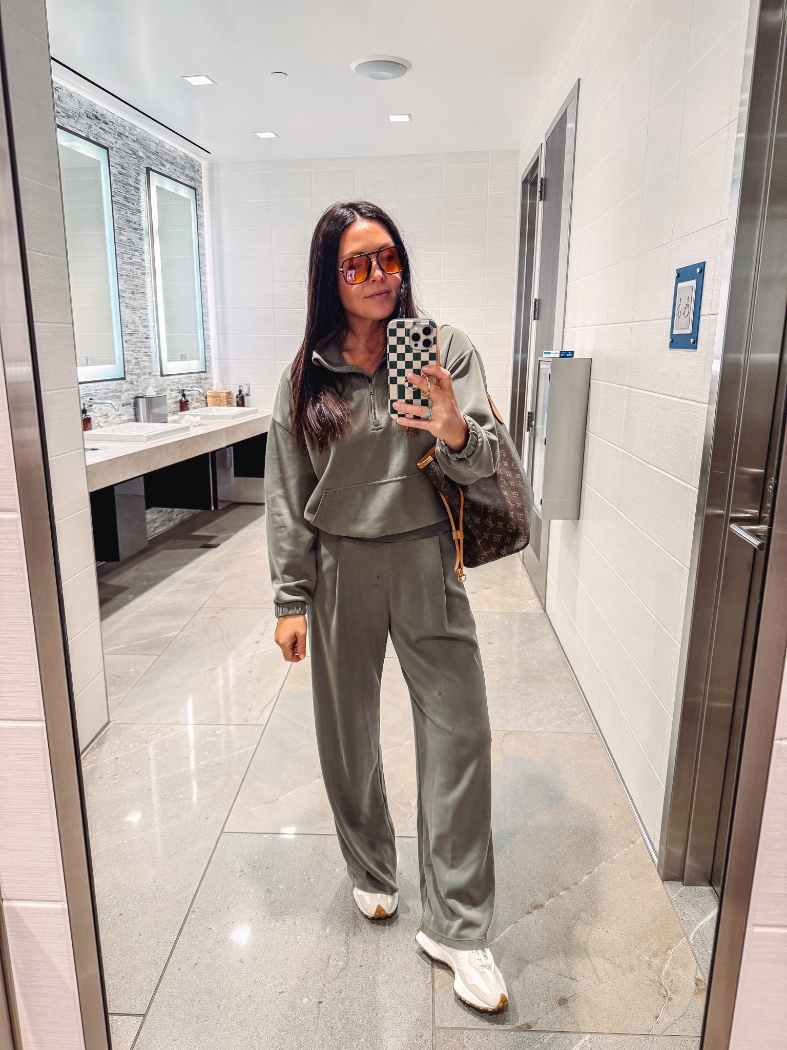 I’ll say it again BEST TRAVEL OUTFIT SET. 
Lululemon soft streme look alike set from Amazon that’s 1/3 the cost but equal in quality. Love the pleated pant front for a more classic feel but comes in several colors and styles. I’m wearing 39” inseam and I’m 5’5”.

New sneakers im loving. New balance. 
I have these sunnies in a couple colors. They are a vibe. 

#LTKTravel #LTKFindsUnder50 #LTKSaleAlert