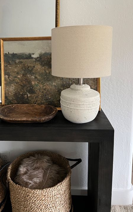 Here's the lamp seen in my REEL 
Styled it with a wooden bowl and art piece. 
Console table 
Basket 

#LTKunder50 #LTKhome #LTKunder100