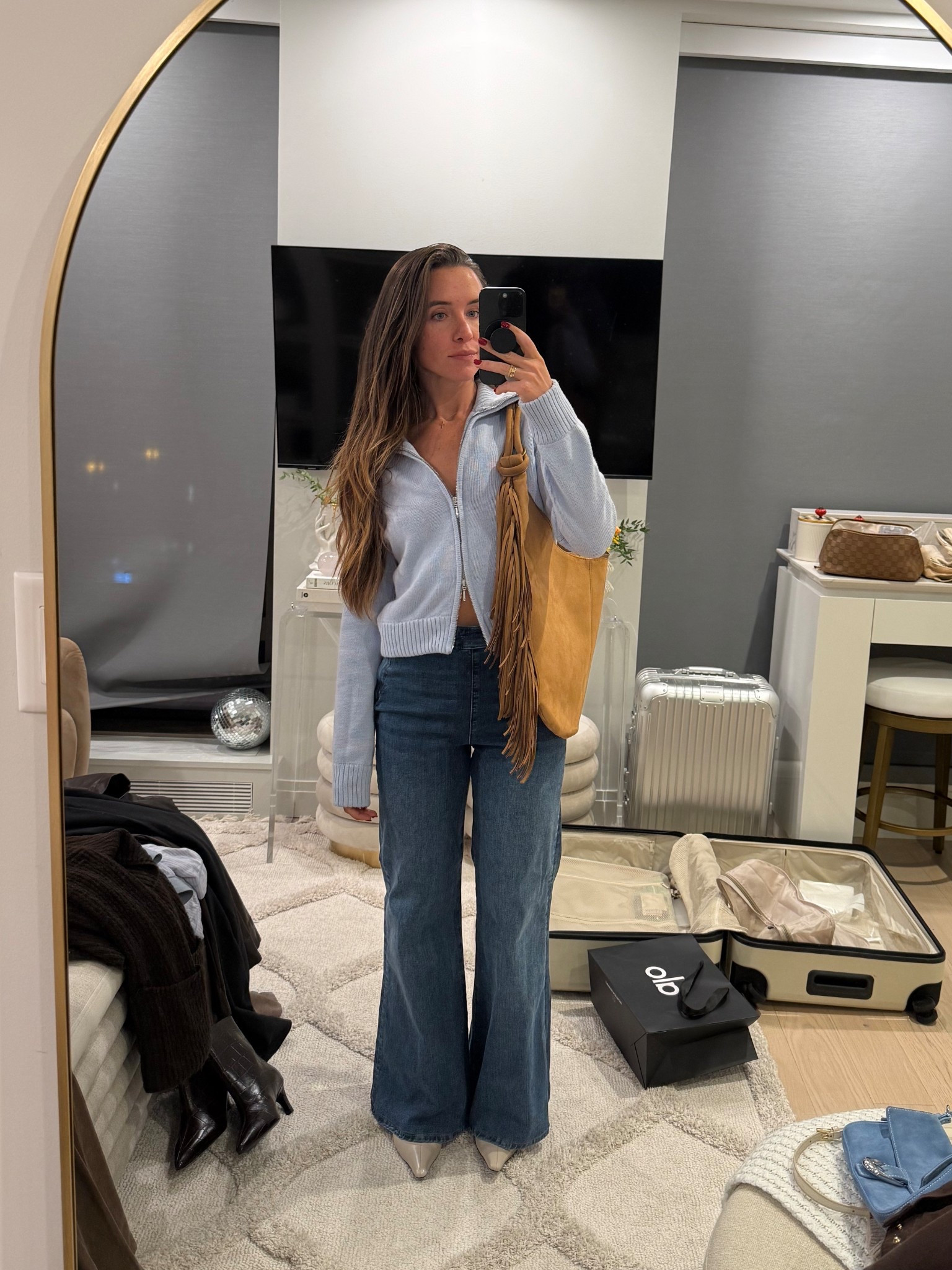 fall western inspired day outfit for aspen 

blue zip up sweater is an XS

linked similar flare jeans from Abercrombie

This shoulder bag with fringe is so fun for fall



#LTKSeasonal