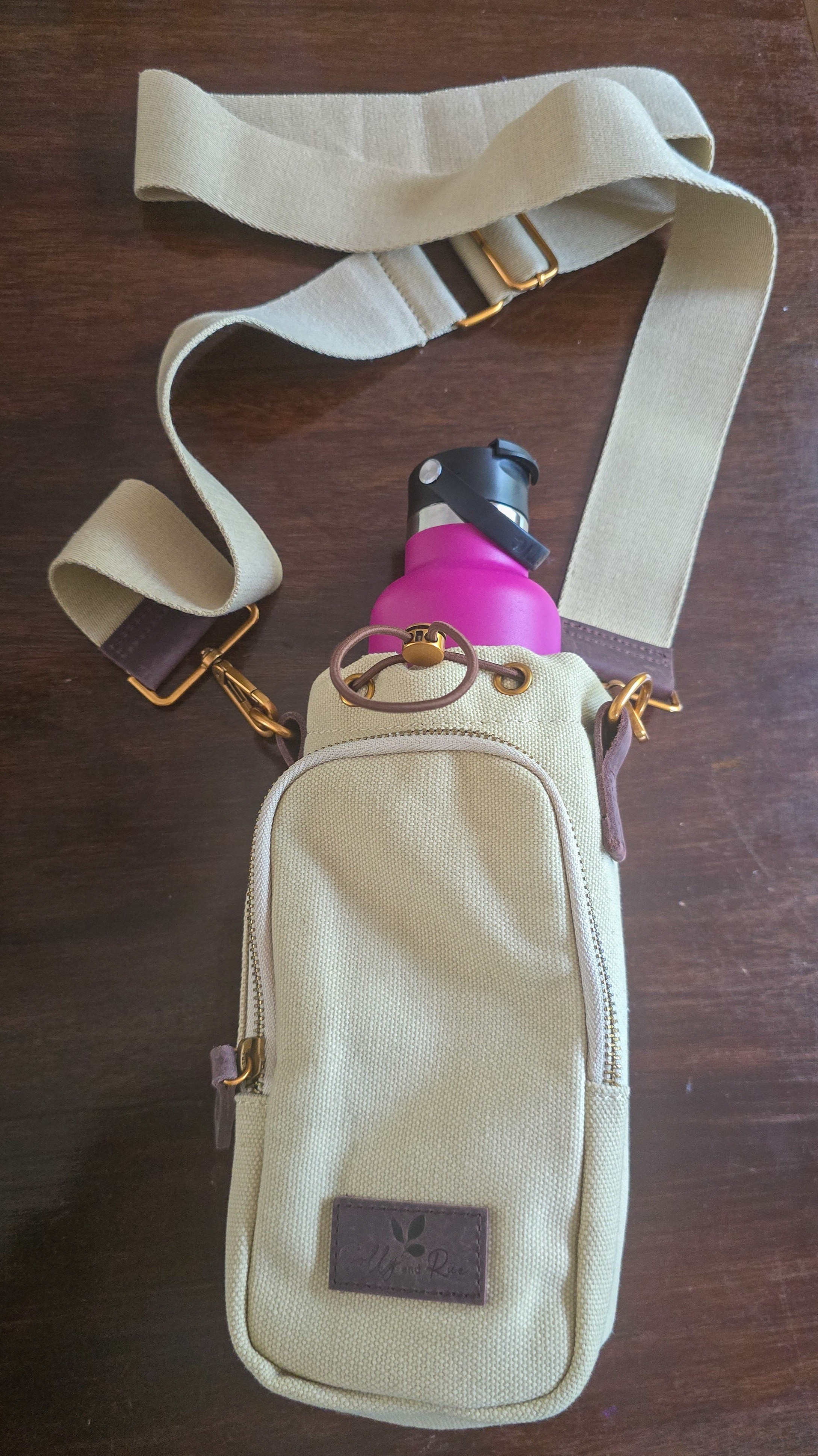 Whether I’m traveling, at the playground, or walking around town, the Solly & Rue water bottle holder is the bag I didn’t know I needed.It keeps my hands free (for coffee, snacks, or a toddler hand 🫠) and makes sure I don’t forget my water. Practical + stylish = win.

#LTKFindsUnder50