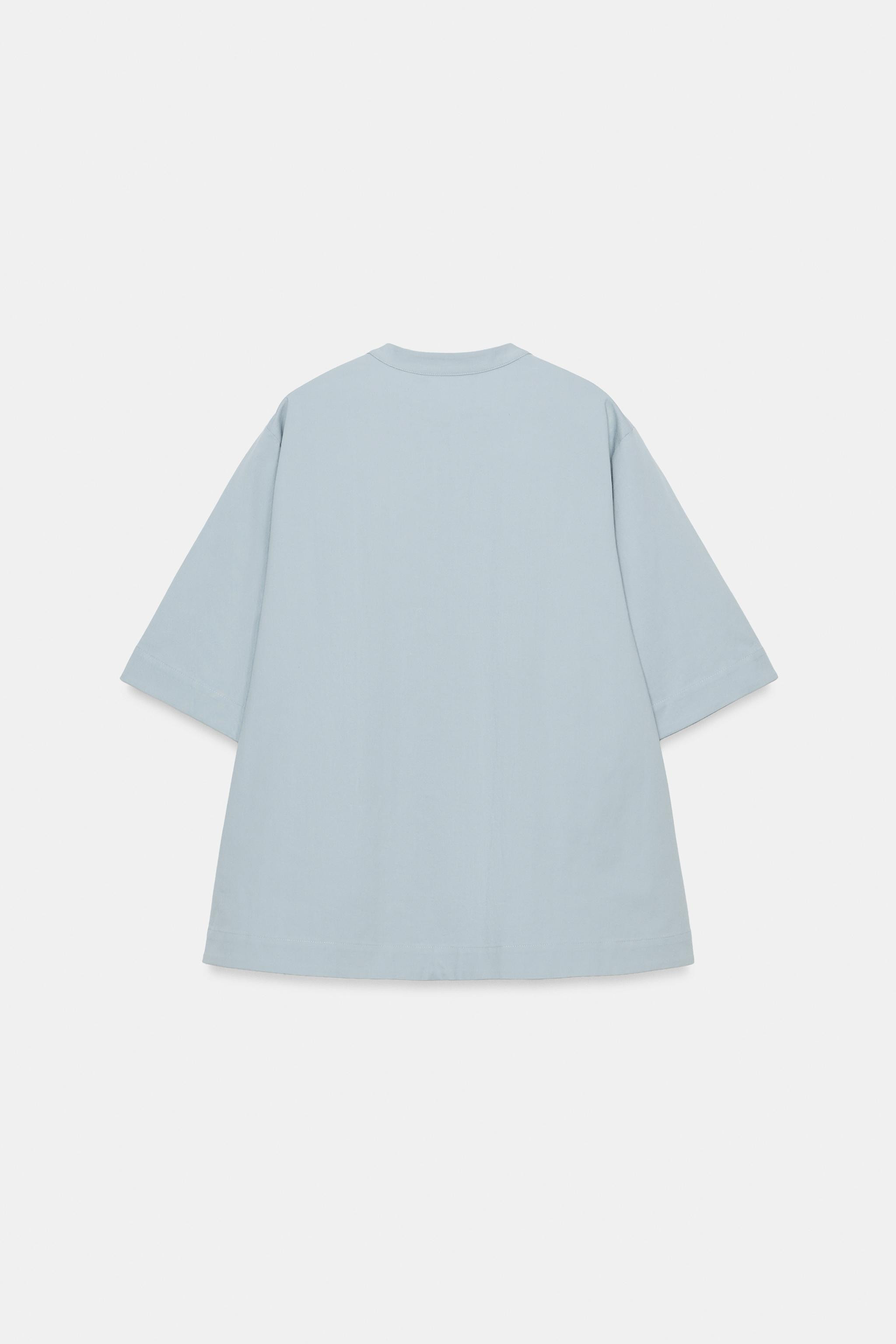 Model height: 178 cmZARA WOMAN COLLECTIONShirt made from a cotton blend yarn. Features a round ne... | Zara UK