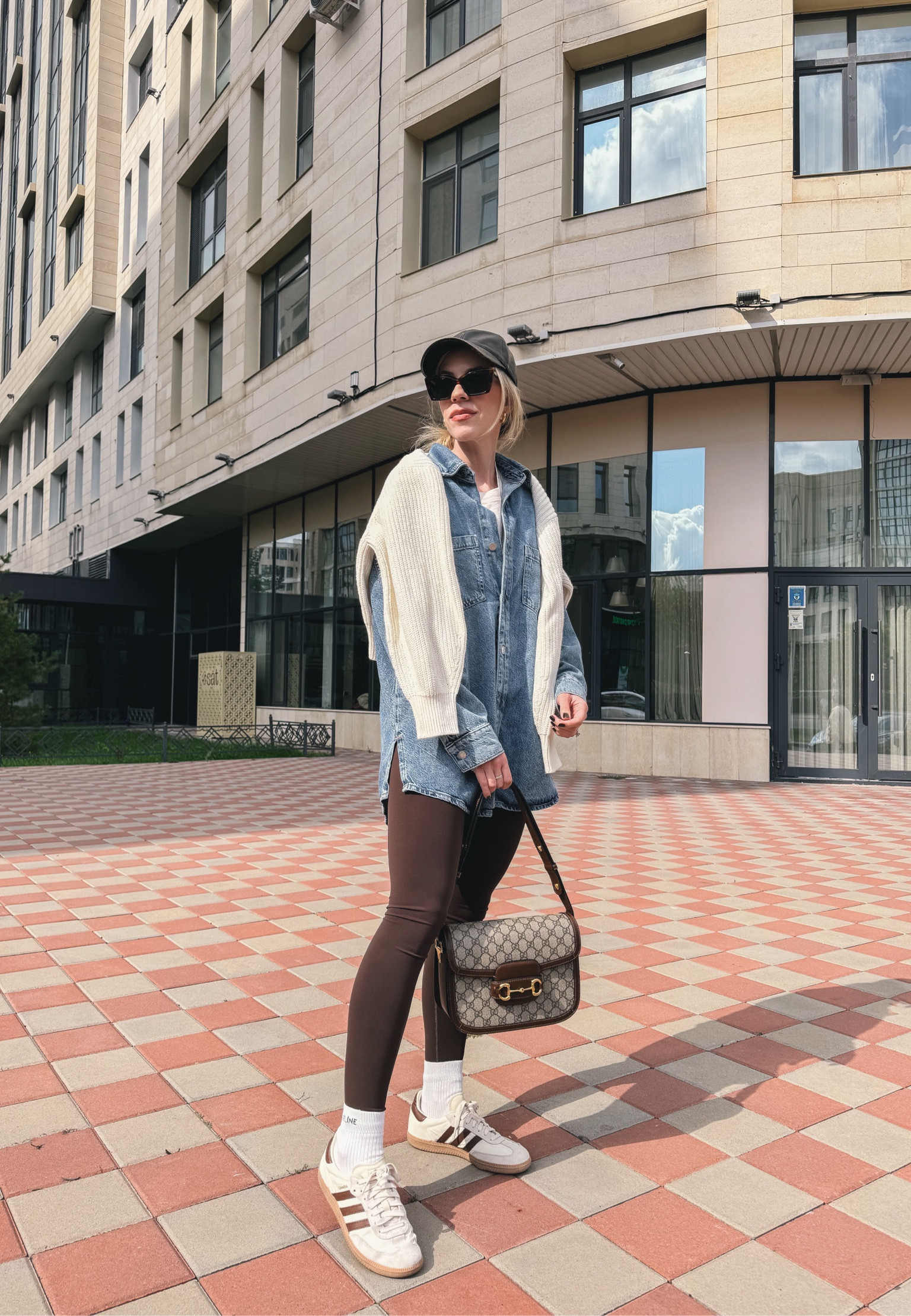Casual fall outfit with oversized denim shirt, sweater over shoulders, dark brown leggings, Adidas Samba sneakers, Gucci bag

#LTKActive #LTKFindsUnder50 #LTKShoeCrush
