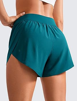 CRZ YOGA Mid Waisted Split Running Shorts for Women 4" - Comfy Mesh Liner for Workout Athletic Gy... | Amazon (US)