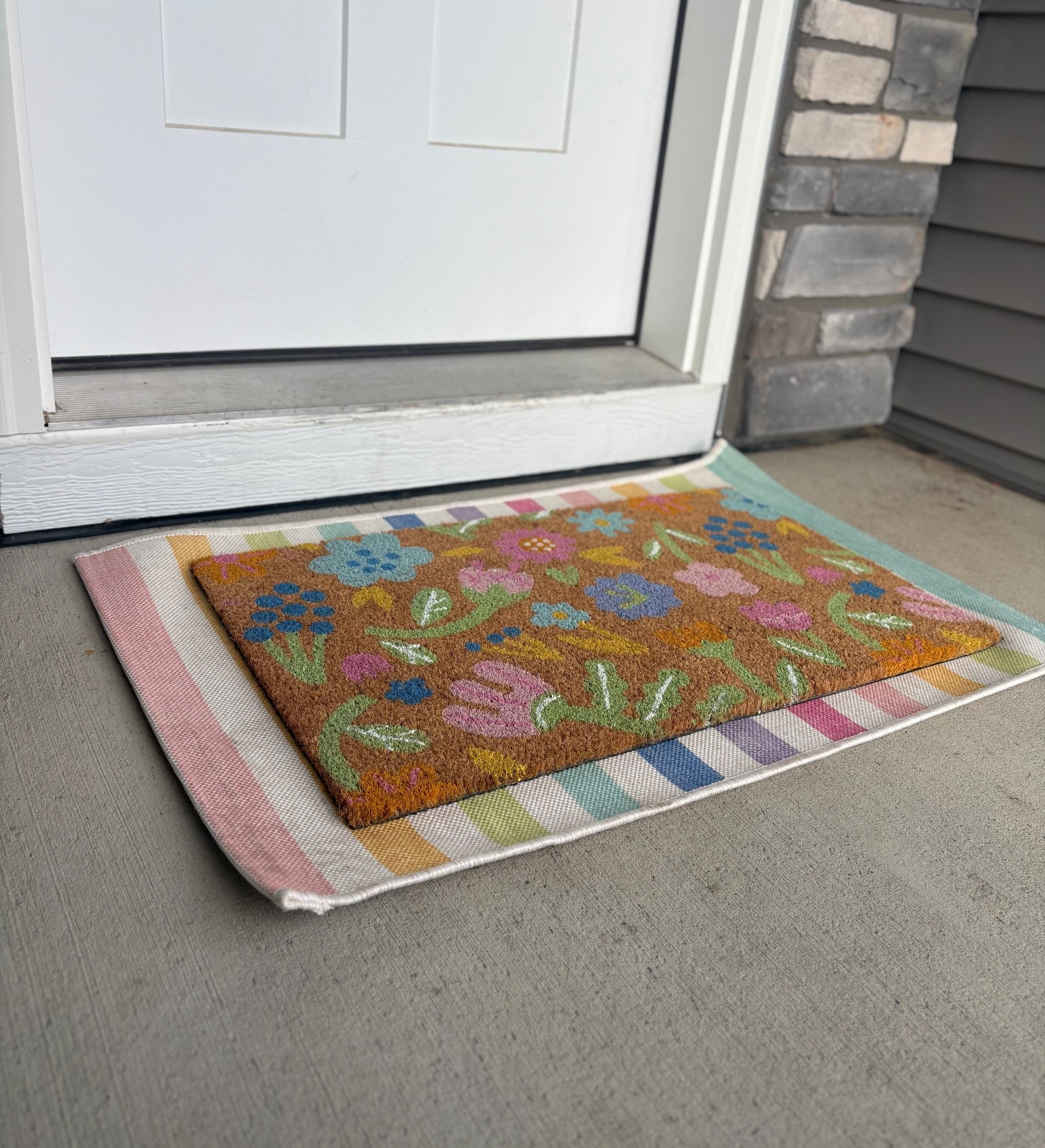 POV: you want a cute spring porch but also need it to survive muddy kids and Amazon deliveries 🌸📦

Layered entry rugs are the move. Colorful outdoor rug + coir doormat = instant charm.

Linked rugs here!

#LTKHome #LTKSeasonal #LTKmomlife