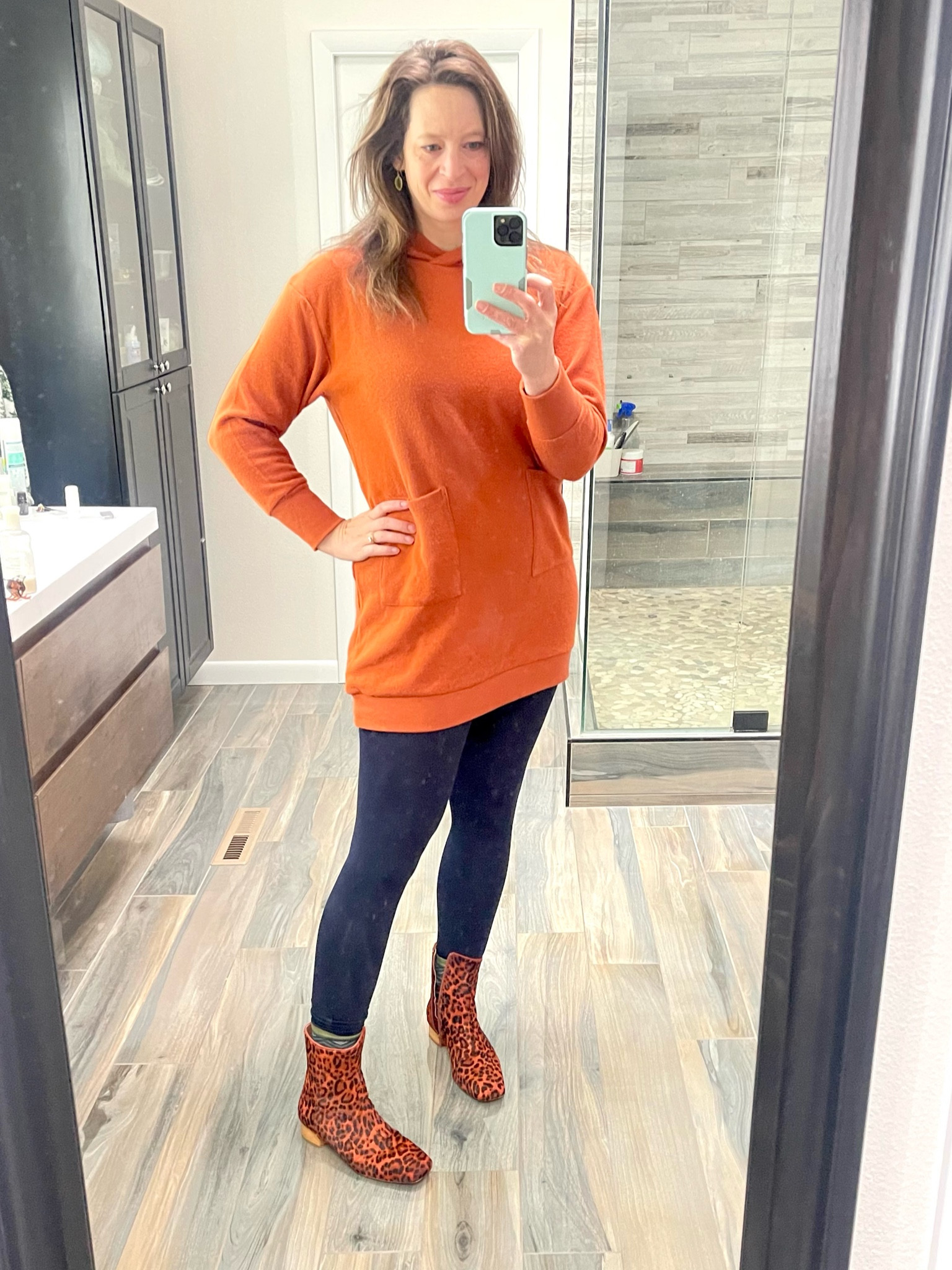 Fleece lined leggings in navy, orange sweatshirt dress, animal print booties.

#LTKstyletip #LTKshoecrush #LTKSeasonal