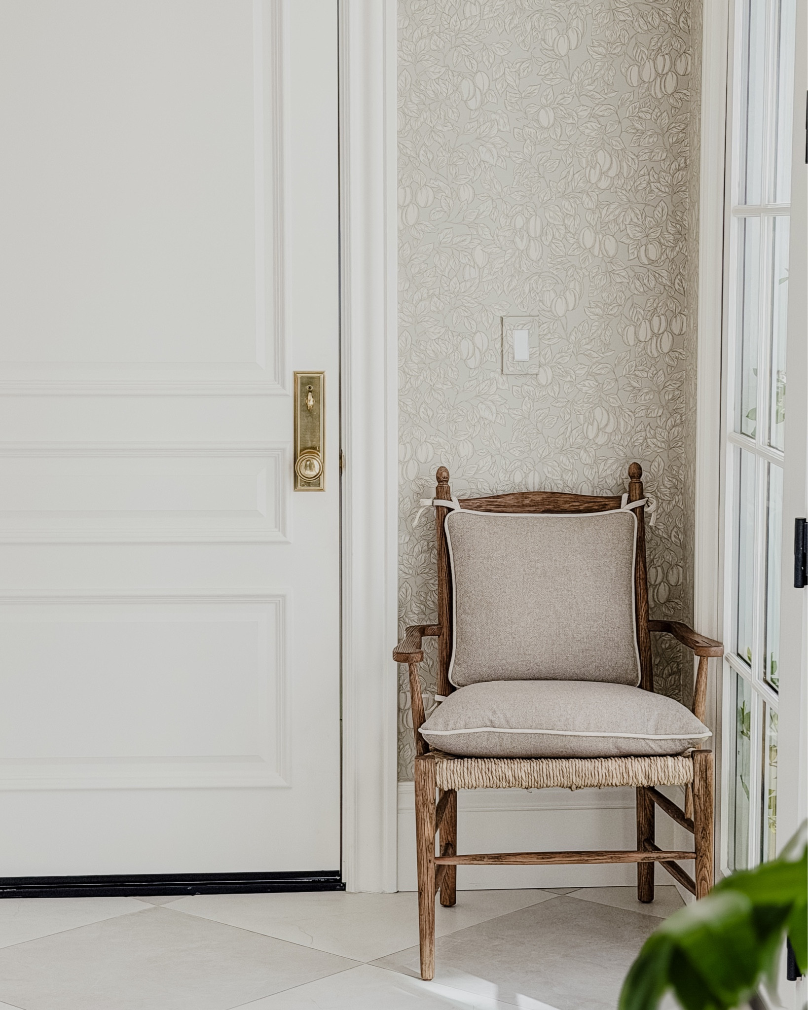 Love seeing the wallpaper peak through into the kitchen!  This was my first large space I have used wallpaper!  Even though this wallpaper is busy, the neutral tone kept it not feeling overwhelming.  And I love how it looks surrounding our white doors and cabinets!

So I’ve heard they are discontinuing the Sterlina tile that I used in my laundry room. 

But they added Sterlina ll.  It’s what I used outside by the fireplace.  It’s basically the same tile as inside,  but the silver is a warmer silver.
I did matte silver and matte white for both.

#LTKSaleAlert #LTKHome