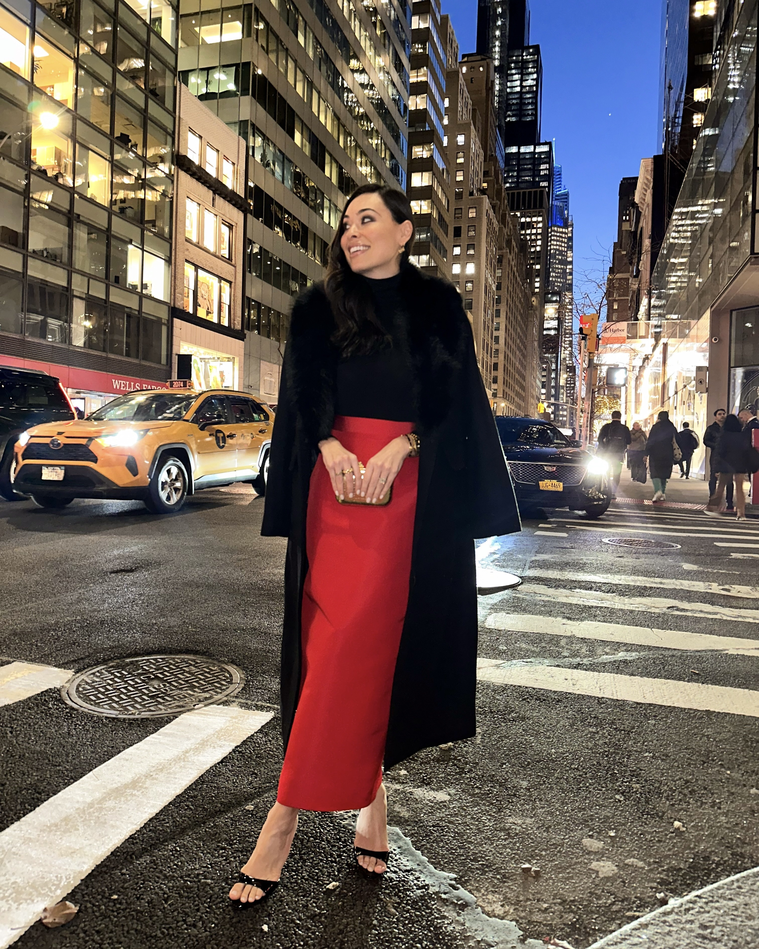 NYC holiday outfit, red skirt, black coat with fur stole, Kat Jamieson style. 

#LTKootd #LTKHoliday #LTKSeasonal
