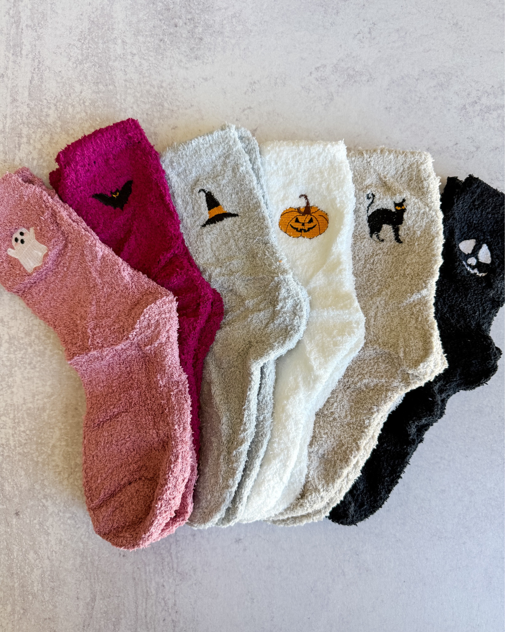 The cutest little Halloween cozy socks! 👻🎃 These would be perfect for boo baskets, teacher gifts or just adding a little spooky season fun to your sock drawer. 

 #LTKSeasonal #LTKOver40 #LTKMidsize