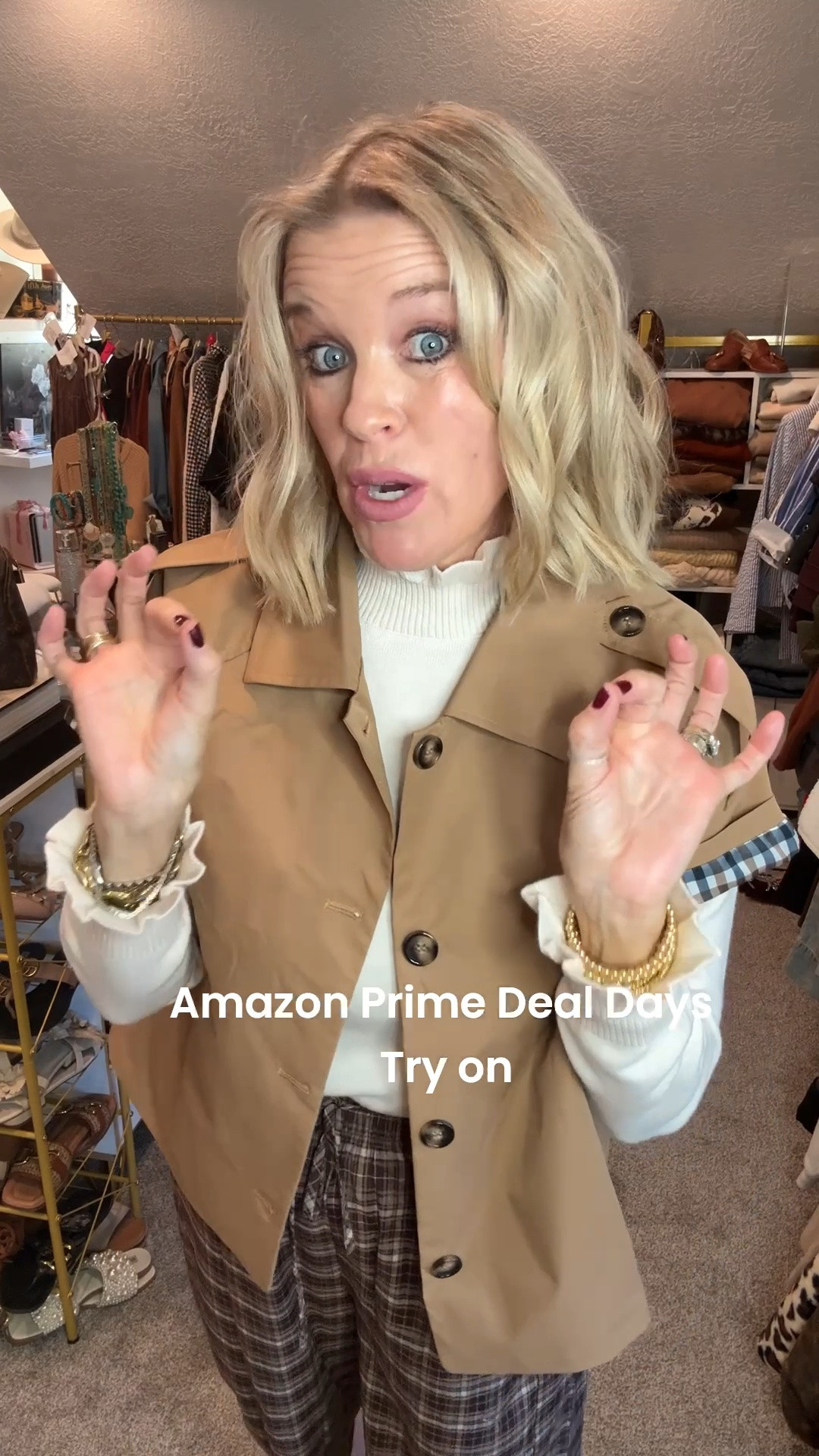 Amazon Deal days
Try on edition

-Short sleeve trench coat.
-Ruffle tartness sweater 
-plaid pants with lace bottoms 
-gold beaded bracelets 

-suede and gold buckle slides- Steve Madden Nordstrom

-Linked affordable similar