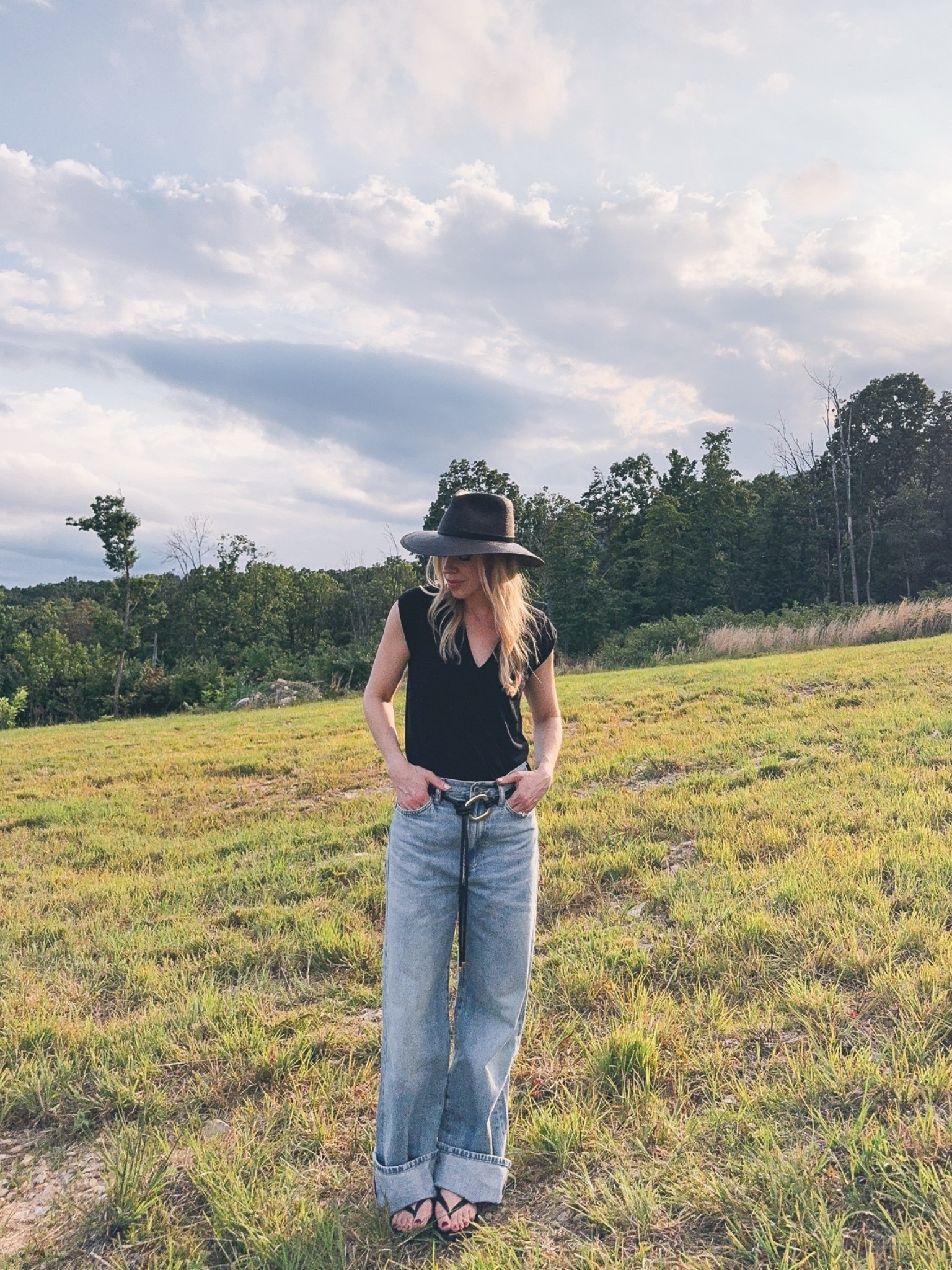 Casual summer look, country concert, western style, @Zara cuffed baggy jeans, @Janessa Leone straw hat

#LTKSeasonal #LTKOver40 #LTKSaleAlert