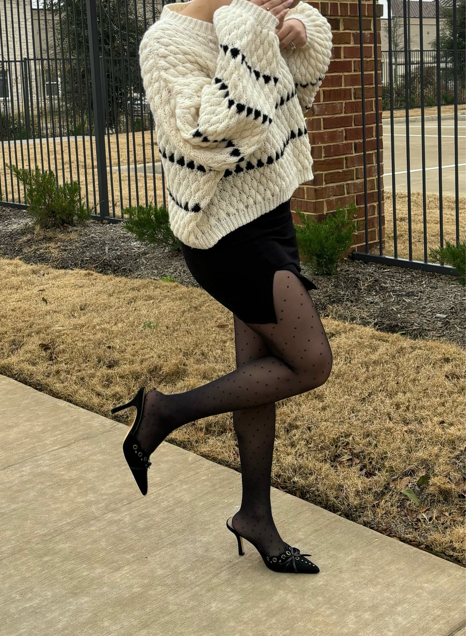 Classy Outfit wearing a black mini skirt with black polka dot tights/leggings with kitten heels and an oversized sweater 💫

#misslola #kittenheels #miniskirt #tights #leggings #sweater #sezane #hollister 

#LTKGiftGuide #LTKstyletip #LTKFestival