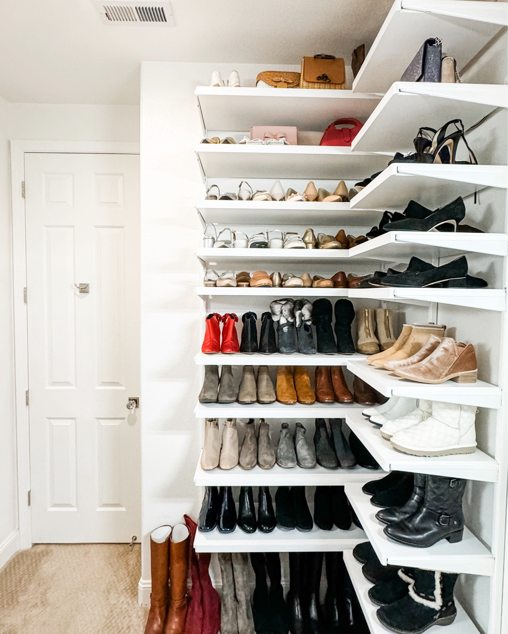 < after … and just in time for boot season! 👢

Previously this corner had a mid-size armoire that contained jewelry and accessories. We transformed this corner - adding more space - by installing floor to ceiling shelving to display her shoes, which were scattered in different places or in boxes that weren’t easy to locate.

In love with the outcome 🤍

#LTKshoecrush #LTKhome