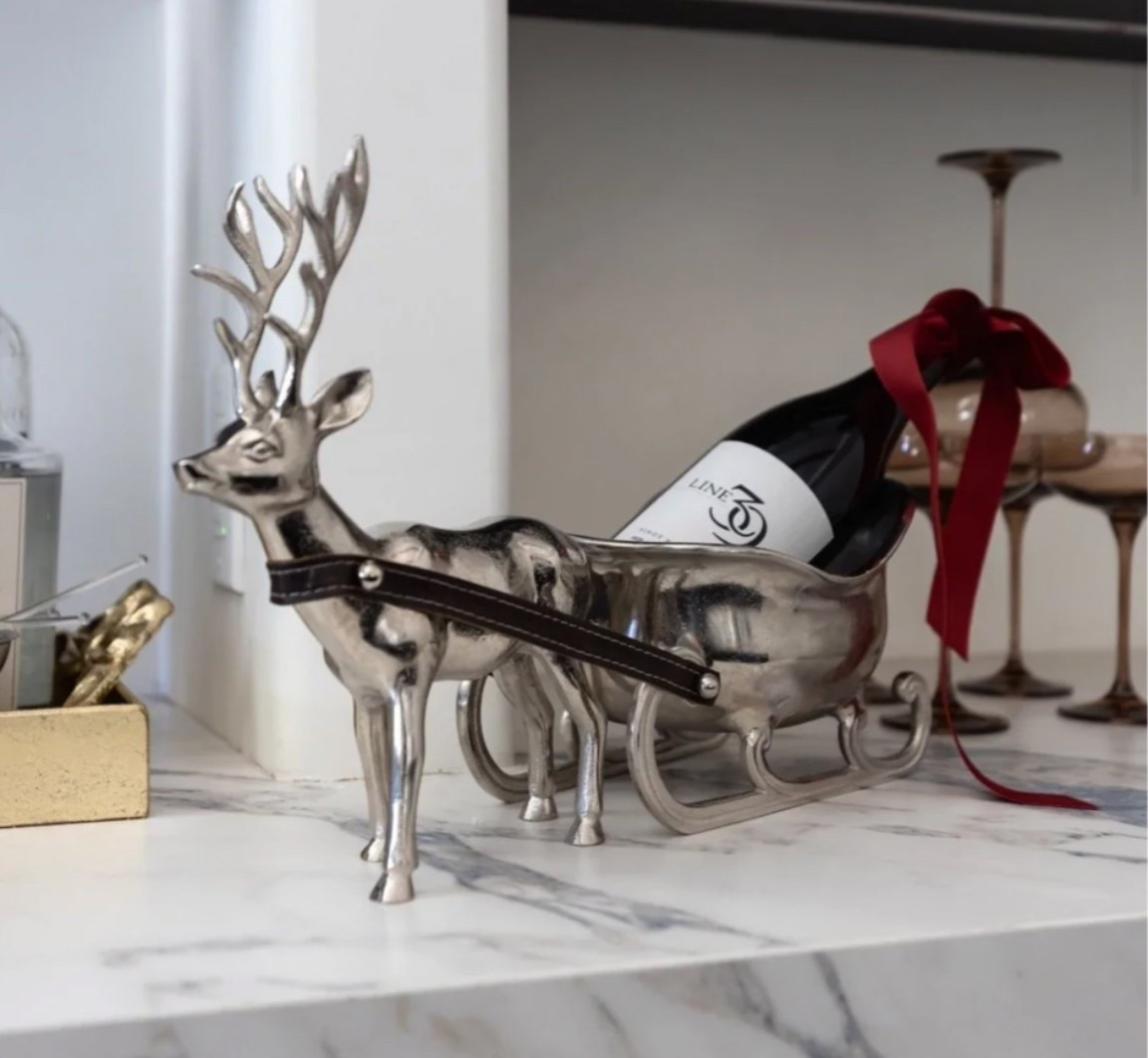 This little reindeer and sleigh wine holder makes the most beautiful host gift.

#LTKSeasonal #LTKHome