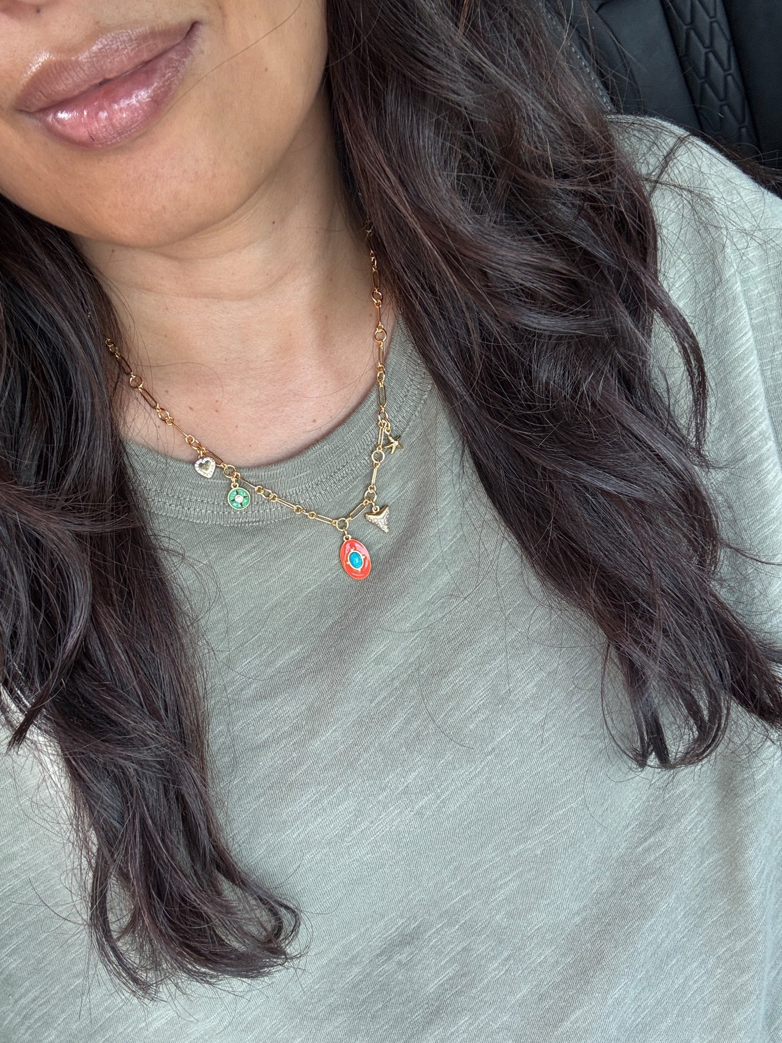 Charm necklace. Cute gold necklace adds a touch of color to a neutral top. Code Naomi20 to save. 
Favorite lip oil lip gloss in shade pointelle is a good clean beauty option. 

#LTKBeauty #LTKFindsUnder100 #LTKOver40