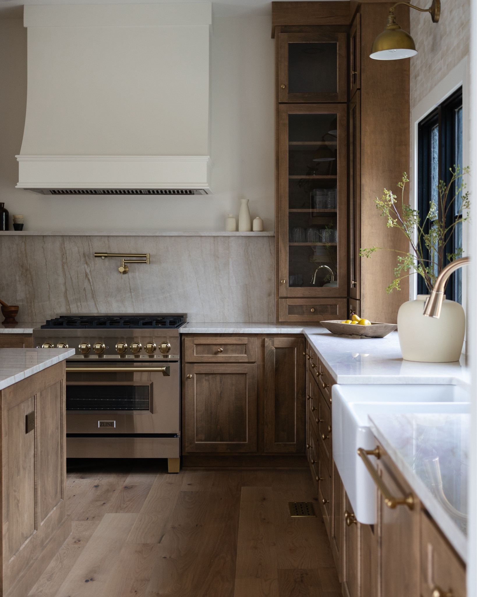 One of my favorite client kitchens 🤍 Designed to feel timeless, warm, and functional while still feeling elevated and intentional. I love mixing classic elements with modern details to create a space that truly works for everyday life but still feels beautiful.

kitchen design, designer kitchen, modern traditional kitchen, neutral kitchen decor, custom kitchen design, warm wood kitchen, elevated kitchen details, timeless home design, kitchen styling, high end kitchen inspiration

#LTKHome #LTKSaleAlert