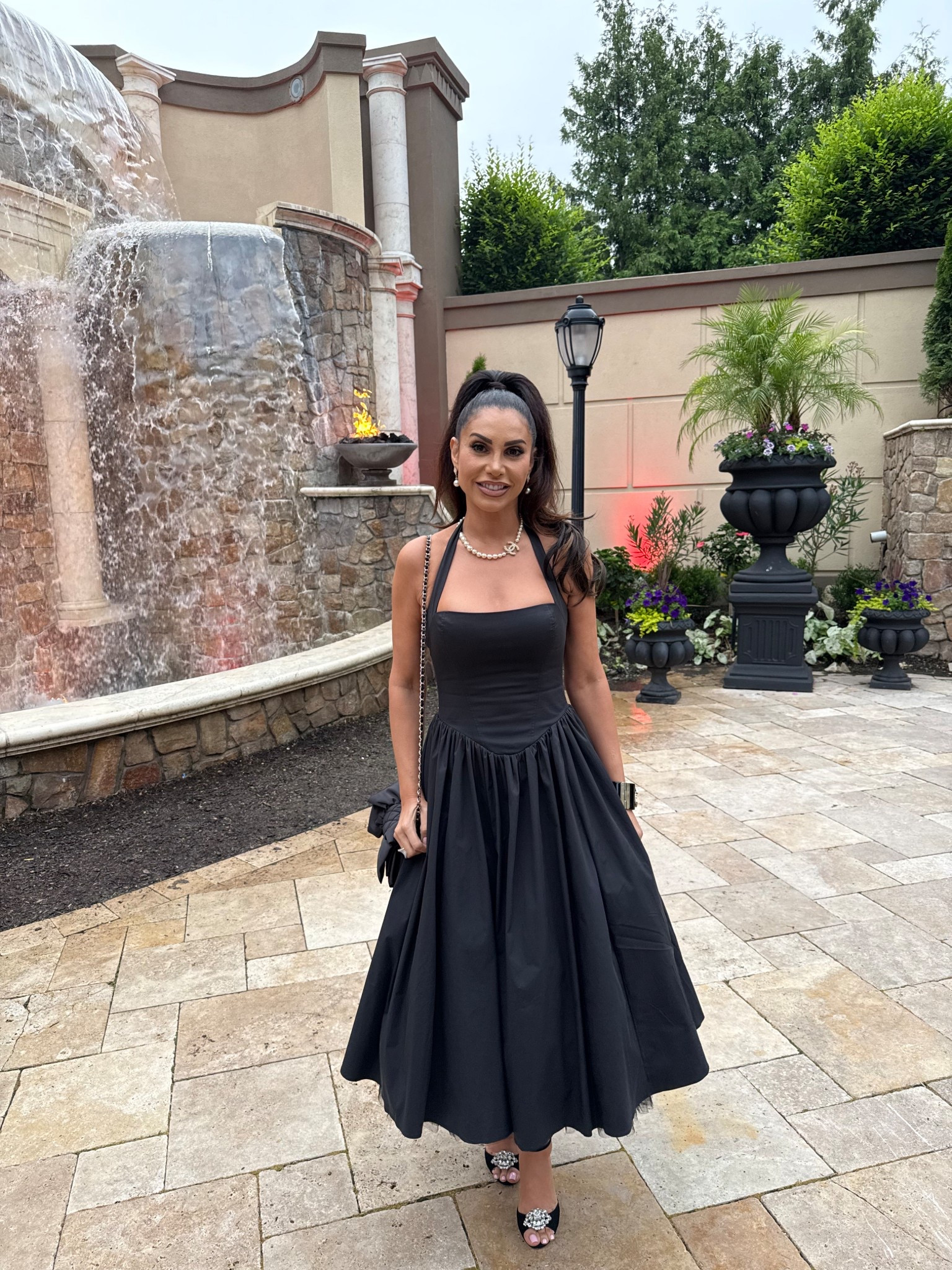 It’s wedding Season! I’m wearing a size medium
For your reference- these run
Small. I paired it with Jimmy Choo shoes that are not available anymore in my necklace and bag are by Chanel. But you could add your own style and make this look your own.