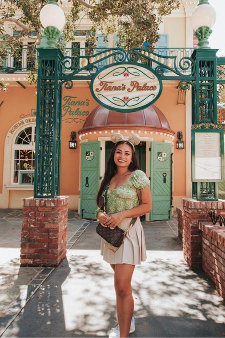Green Disney outfit for princess Tiana 💚 top is from @aerie (m), olive pleated skirt from @aritzia (8)

#LTKmidsize #LTKstyletip #LTKtravel