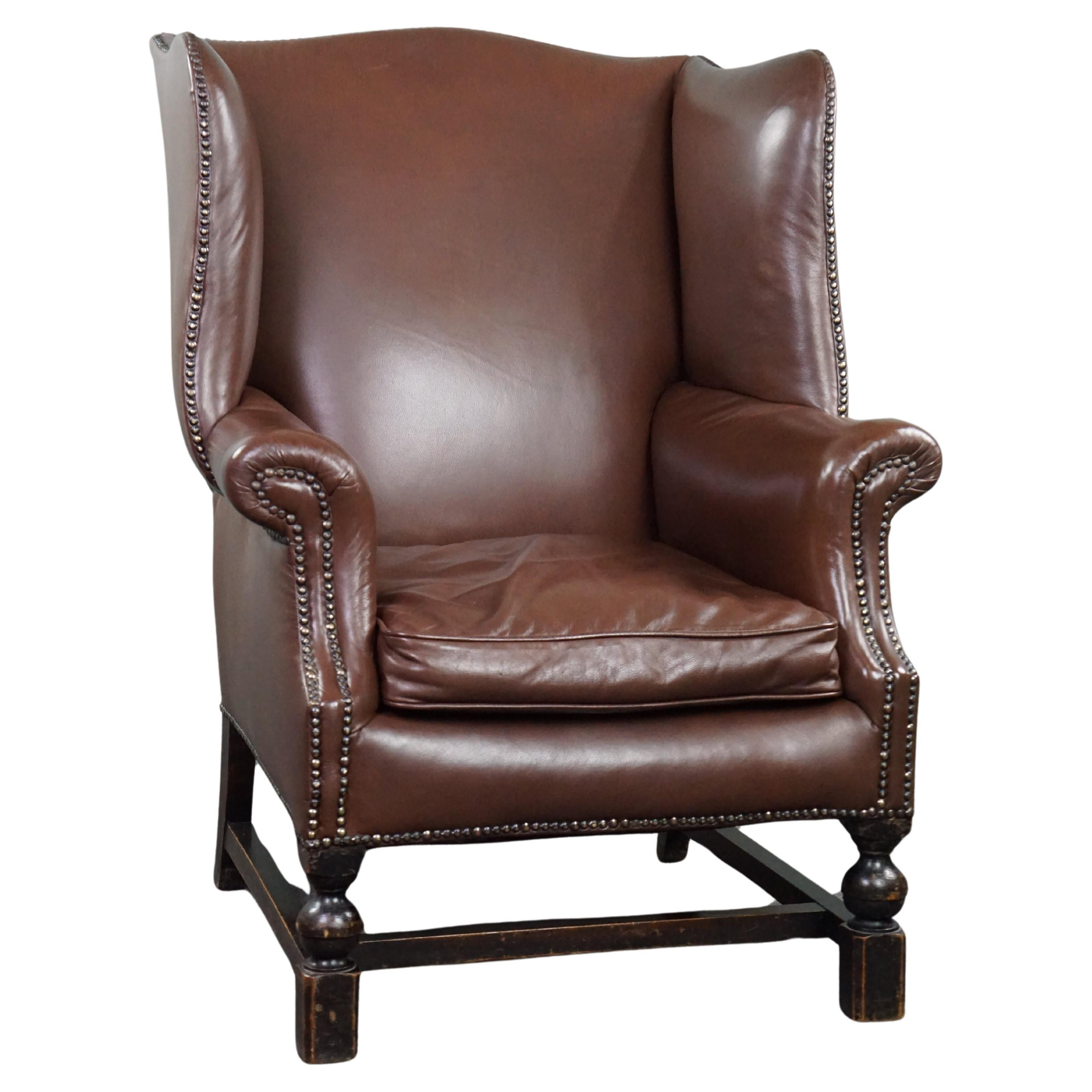 Stylish Classic Leather Wingback Chair | 1stDibs