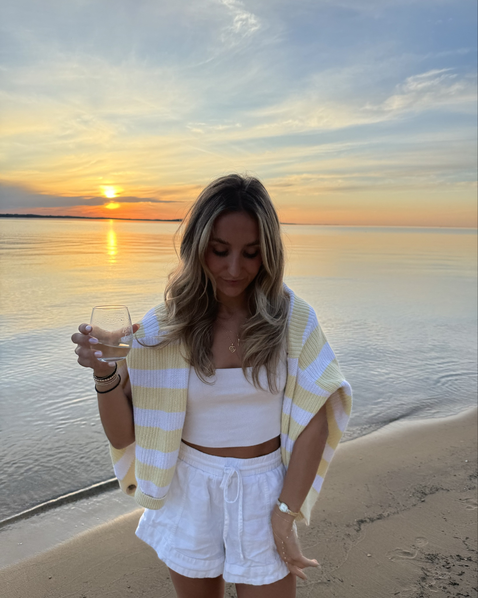 Yellow and white striped cardigan summer sunset outfit!  

#LTKSeasonal #LTKSummerEdit #LTKFindsUnder50