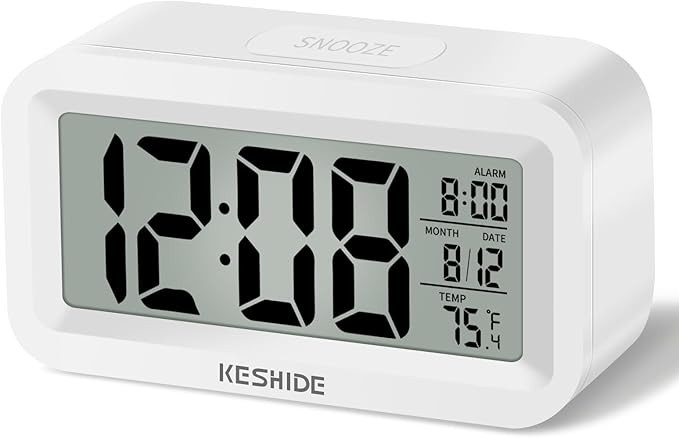 Travel Digital Alarm Clock, Battery Operated with Indoor Temperature, Desk Small Clock,Snooze Mod... | Amazon (US)