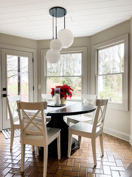 COME ON IN: This light fixture gets comments the moment someone walks into our space! Perfect blend of modern (black metal) with vintage (milk glass). 

#LTKhome