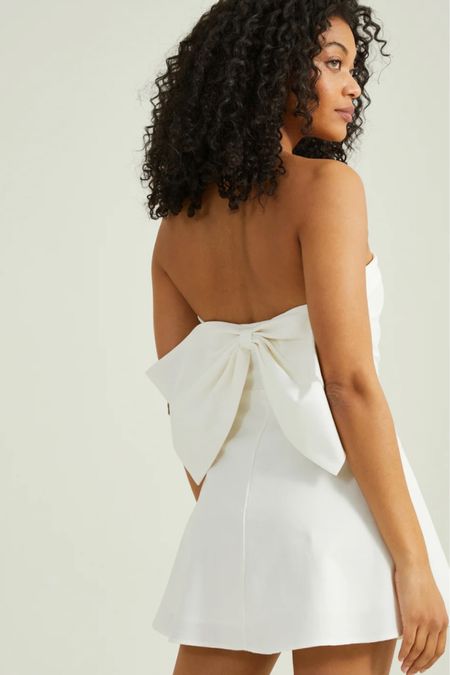 STRAPLESS BOW DRESS🤍 so cute and it comes in pink too!!!! 🎀preppy style | preppy dress | preppy mini dress | spring break style | spring break outfit inspo | spring break dress | white mini dress | white spring mini dress | bow dress | bow mini dress | LoveShackFancy | LoveShackFancy dress | LoveShackFancy mini dress | LoveShackFancy dupe | LoveShackFancy look alike | LoveShackFancy inspired dress | teen girl style | teen girl outfit inspo | teen girl dress | chic dress inspo | chic mini dress | chic bow dress | chic outfit inspo | chic style | chic graduation dress | graduation dress ideas | Paris outfit inspo | Paris ootd | summer dress inspo | Stockholm style | Stockholm stil | altard state dress | altard state outfit | 

#LTKGiftGuide #LTKfindsunder100 #LTKMostLoved