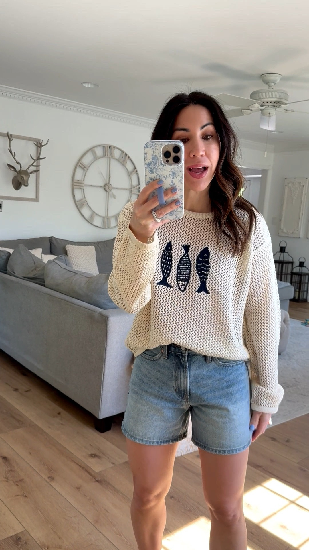 Small crochet sweater. Small denim shorts.

#LTKOver40