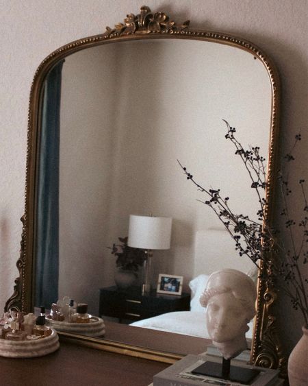 Living in a rental? Statement pieces are a game-changer! My top pick is the primrose mirror from Anthropologie, paired seamlessly with the West Elm dresser, giving the space a fancy yet cozy vibe. 
.
.
#Homedecor #apartmentdecor #apartmentinspo #apartmentdecoratingideas #roomdecor #decorideas, #vintagehomedecor #moodydecor #neutralhome

#LTKstyletip #LTKhome #LTKsalealert
