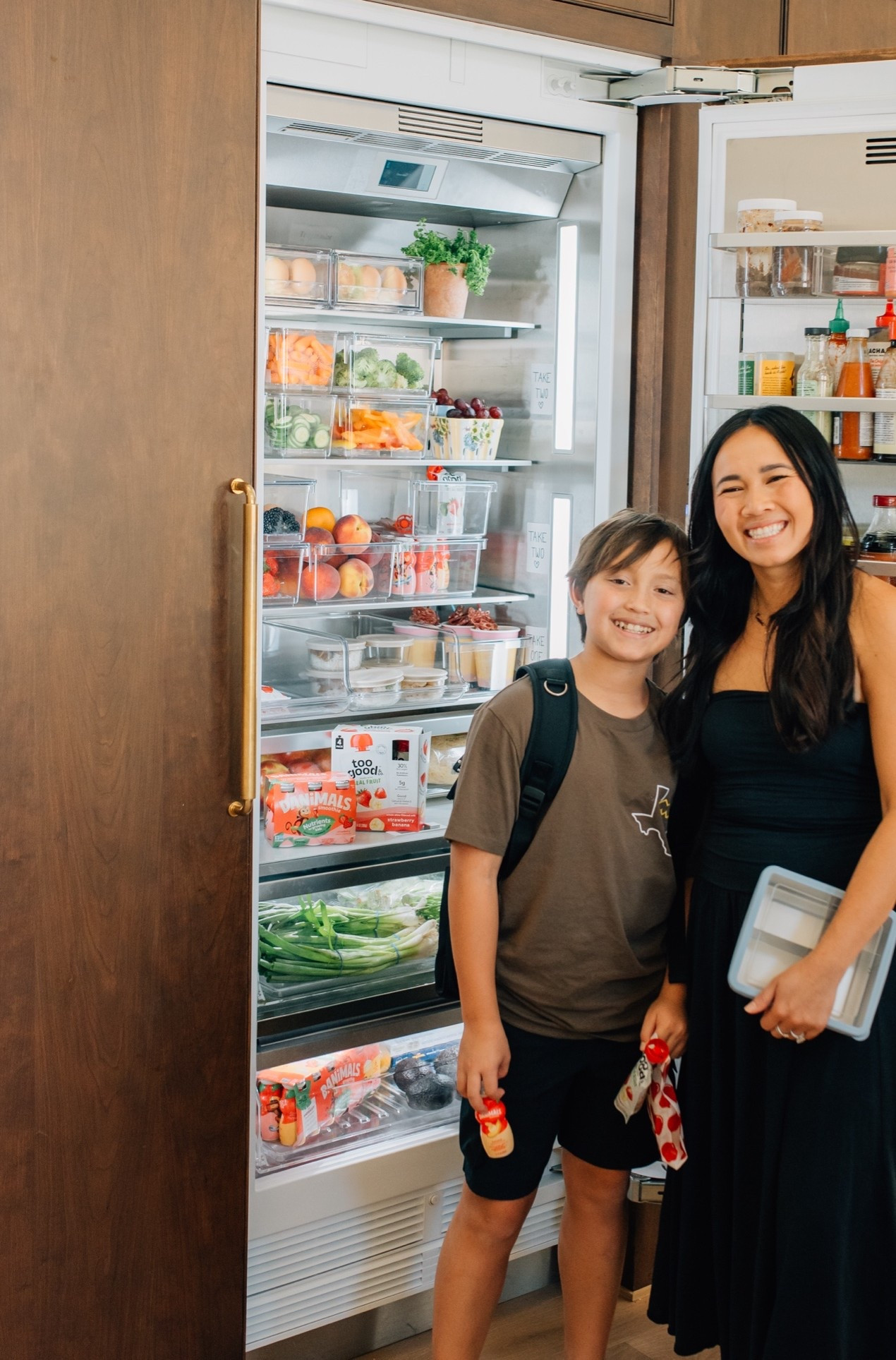 #ad Back-to-school lunch prep is so much easier with our grab-and-go fridge system! 🙌 The kids always reach for Danimals to add to their lunch, and I love that it's a great source of calcium, vitamin D, and fiber. Grab yours at @target, and don't forget you can get $5 back when you spend $10 or more on qualifying products. 💙 @happyfamilyorganics @danimals @toogoodandco #ad #targetpartner #targetfinds  @shop.ltk #liketkit