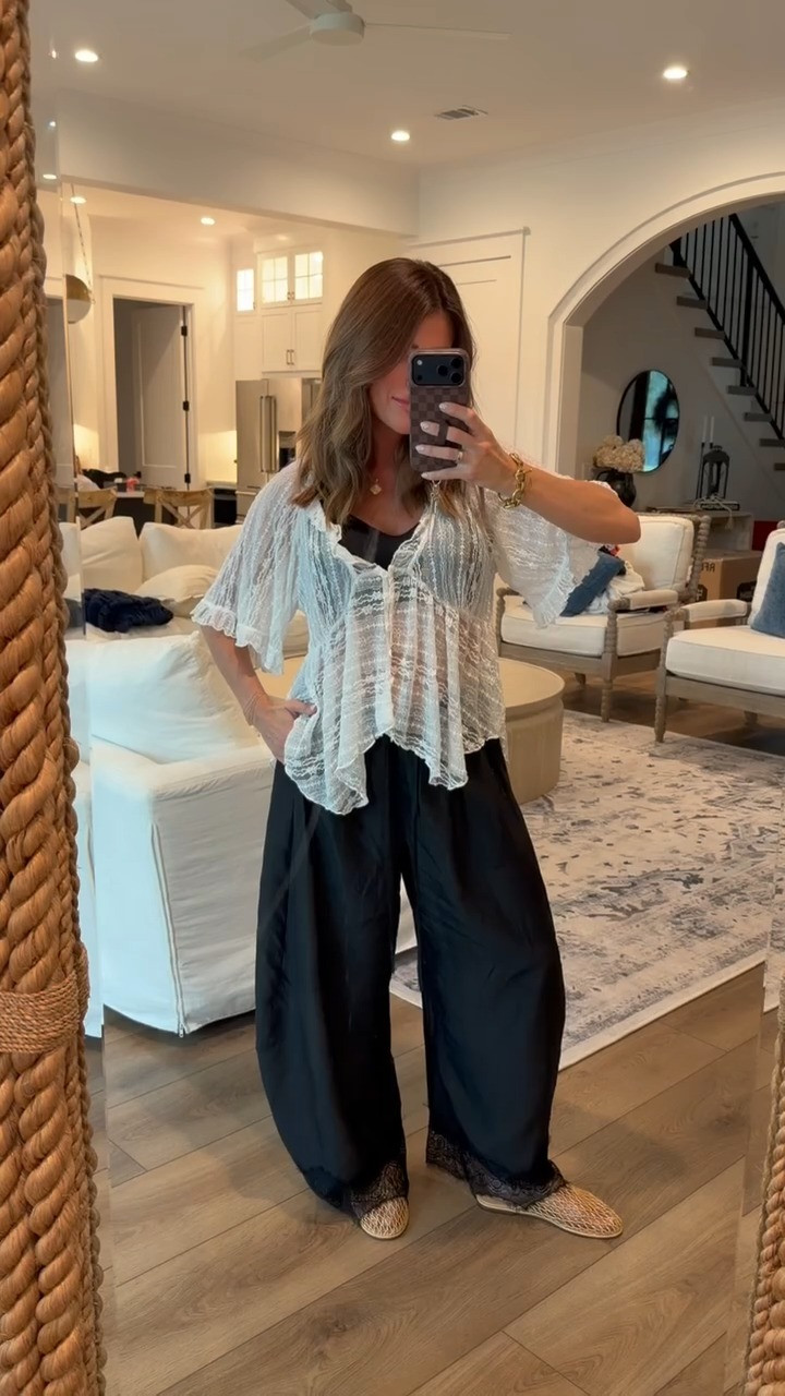 An effortless boho look with a sheer lace blouse, flowy black pants, and woven flats, perfect for an easy transitional outfit.

boho outfit, lace blouse, black pants, wide leg pants, flowy pants, woven flats, sheer top, neutral outfit, casual chic, boho style, feminine outfit, relaxed style, everyday outfit, transitional outfit, early fall outfit, weekend style, effortless outfit, casual fall style, bohemian outfit, chic everyday look

#LTKOver40 #LTKPetite