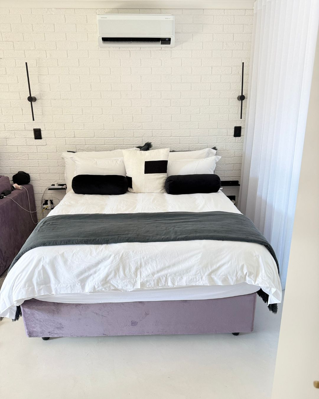 Obsessed with how these sleek black sconces bring balance to the soft lavender and white tones. See how I styled this modern-meets-cozy bedroom on LTK. 

 #LTKHome #LTKSaleAlert #LTKStyleTip