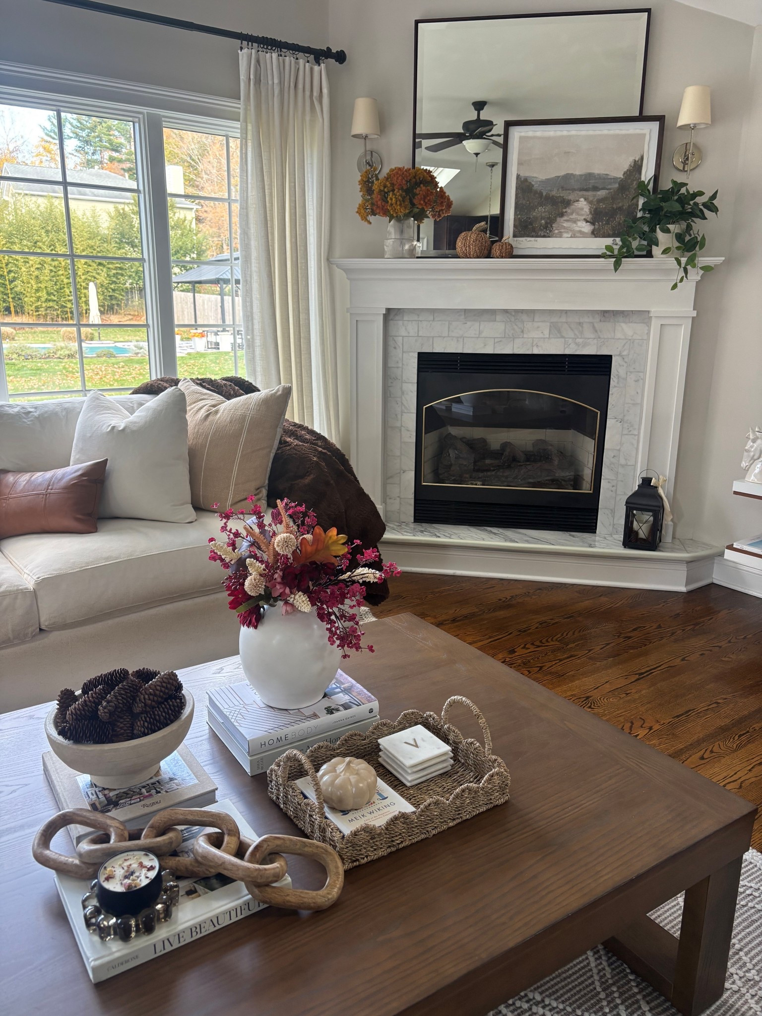 Fall Living Room Refresh / Coffee Table Styling - Amazon Edition!

• Bubble smoky glass candle holder
• Fall Floral Bouquet
• Ceramic Pumpkins
• Woven Pumpkins
• Woven Scalloped Seagrass Tray
• Faux fur throw blanket
• Faux leather throw pillows

.
.
Neutral Thanksgiving Home Decor |
Pottery Barn Inspired Living Room | Budget-friendly home decorating

#LTKFindsUnder50 #LTKSeasonal #LTKHome