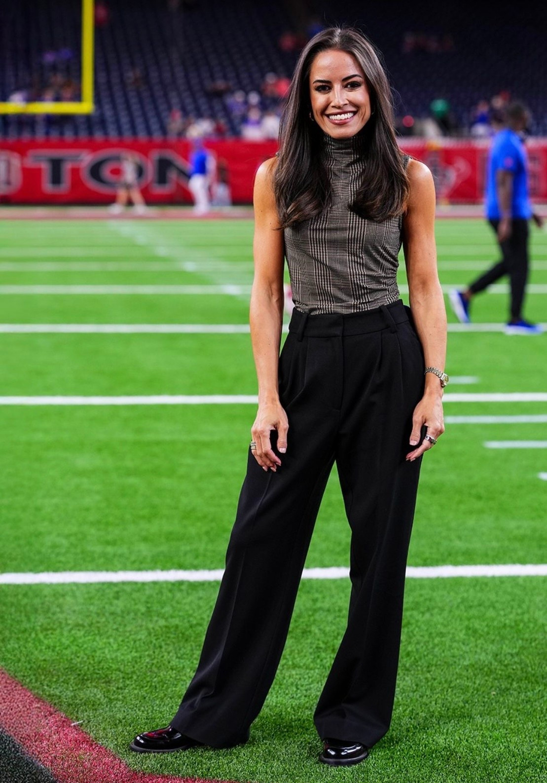 Kaylee Hartung's black Pleated Wide-Leg Pants and Mock Neck Sleeveless Top