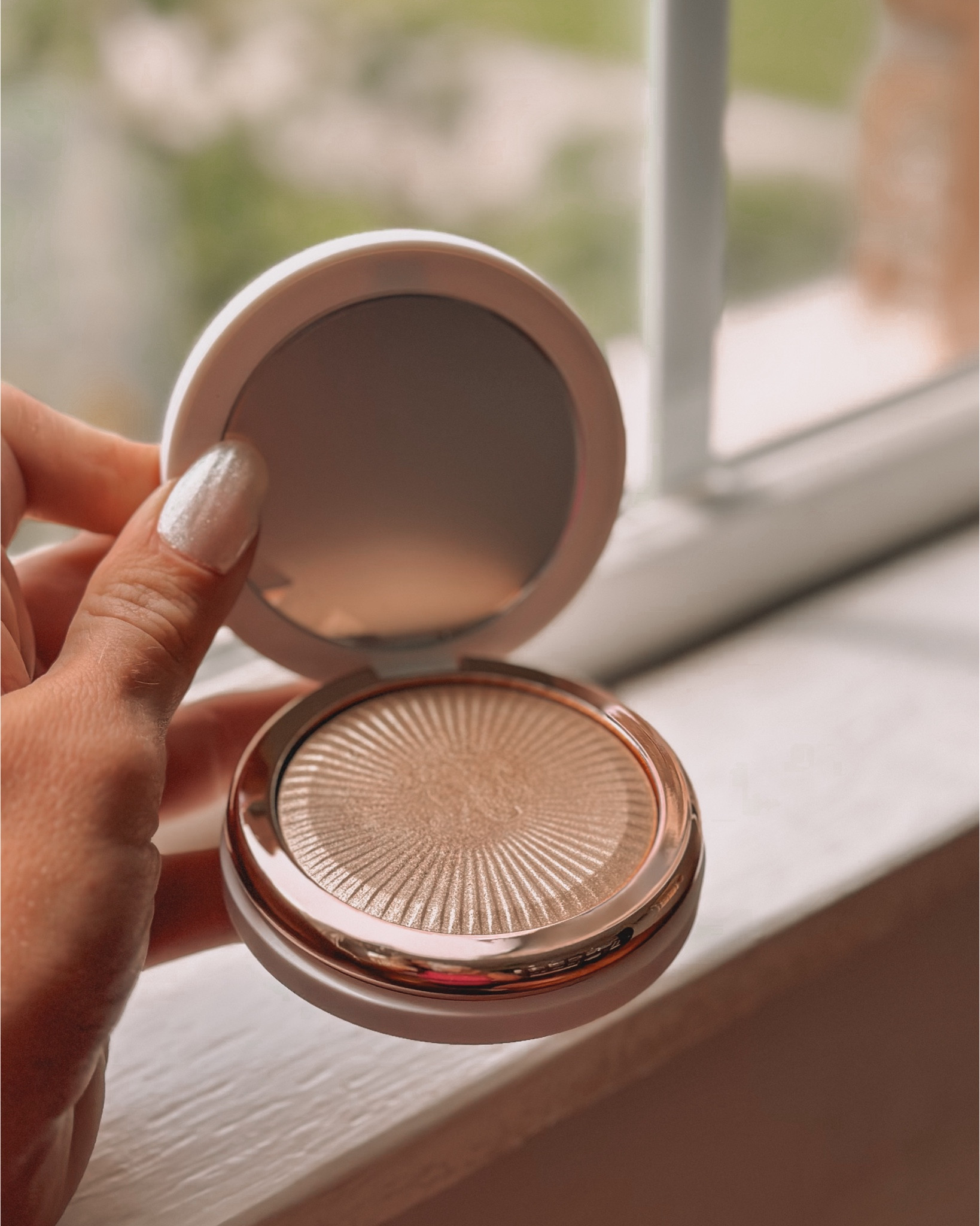 My new favorite highlighter! I use it on my eyes too! Such a good glow. 

#LTKBeauty