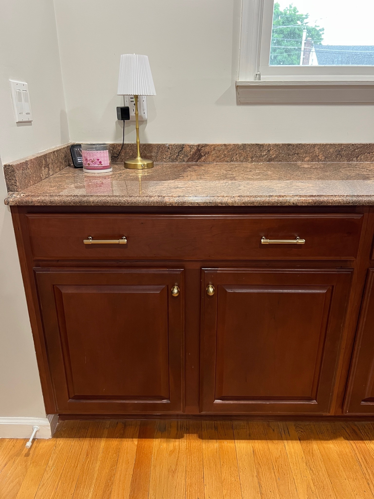 These knobs and pulls are super affordable. I love the way they update the cherry kitchen cabinet decor.

#LTKOver40 #LTKHome #LTKstorytime