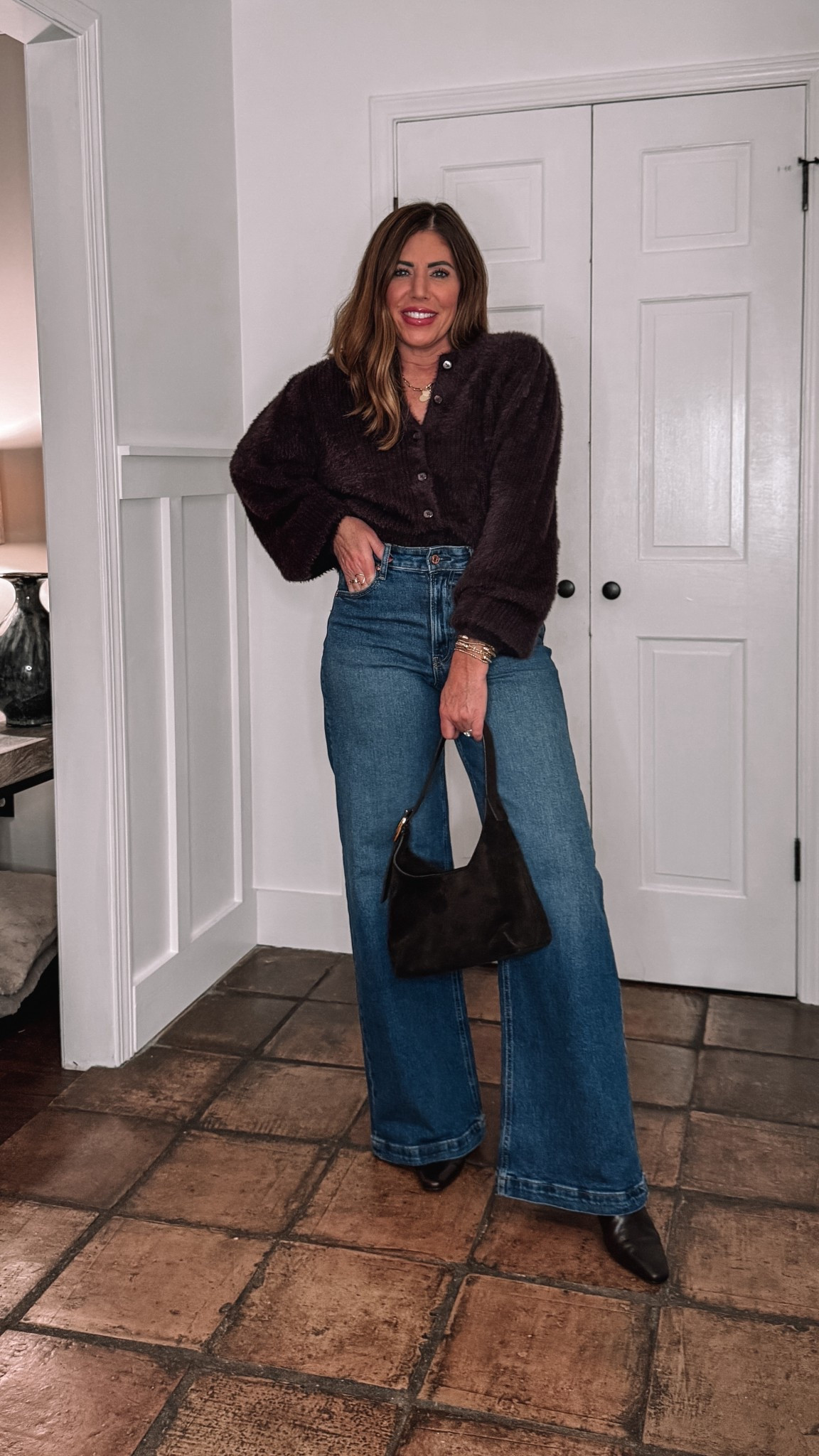 This fuzzy cardigan is on sale 50% off!

I love this soft cardigan from old navy paired with these wide leg jeans from Gap that are also 20% off!

My Madewell bag is 40% off with code EXTRA

I am wearing a large but definitely could have stuck with my true size medium. It is so cute.
I’m wearing my true size 6/28 long in the jeans
Such a cute outfit to wear to any holiday party or you can wear it to work or church. easy way to dress up a pair of jeans

#LTKFindsUnder100 #LTKSaleAlert #LTKHoliday