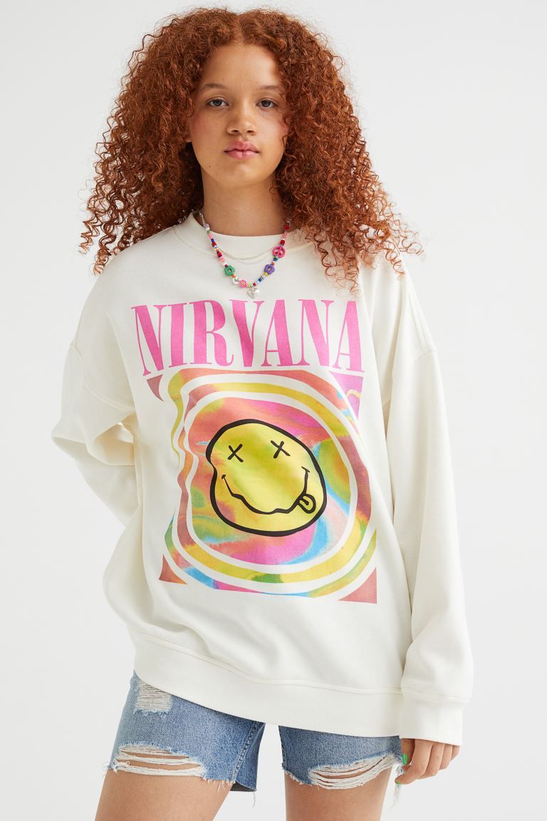 Conscious choice  New ArrivalOversized sweatshirt in cotton-blend fabric with a printed motif at ... | H&M (US)