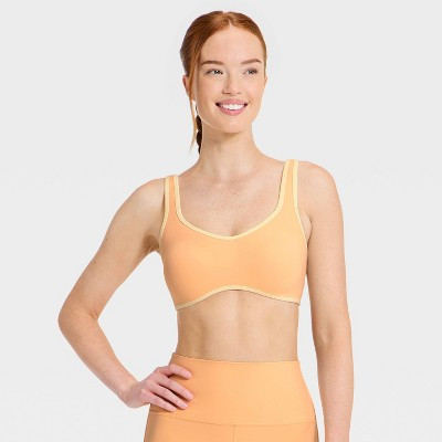 Women's Everyday Soft Light Support Retro Contrast Hem Sports Bra - All In Motion™ Melon Orange S | Target