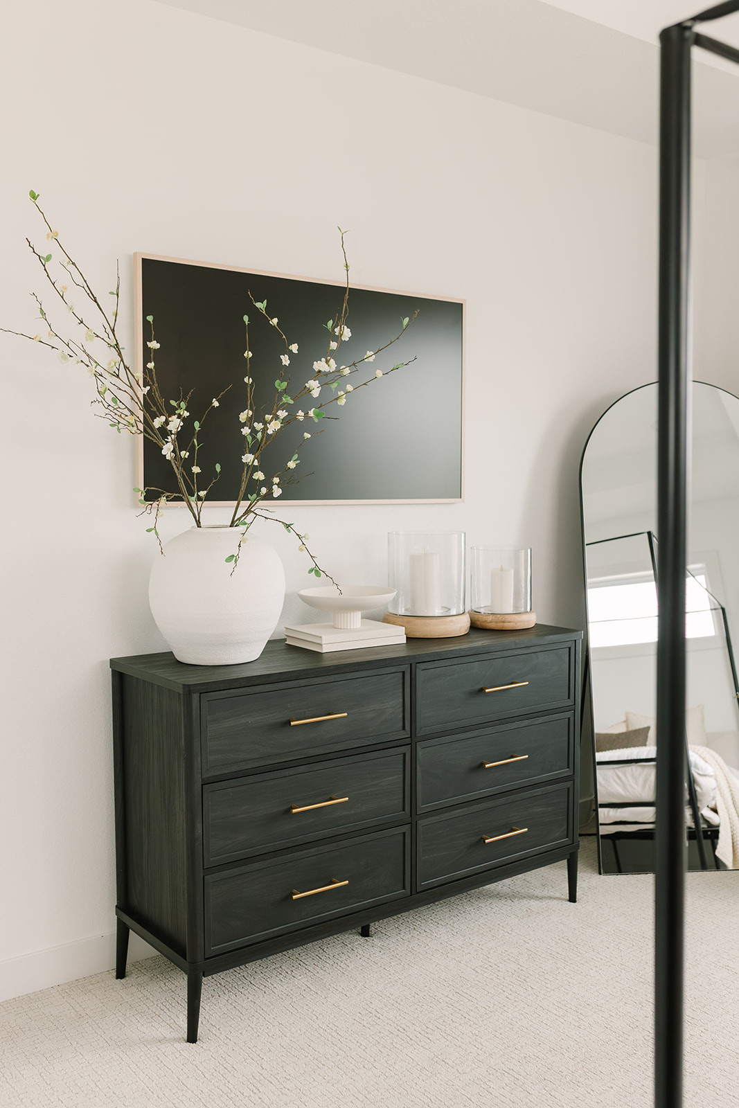 Pretty and simple dresser decor. 

 