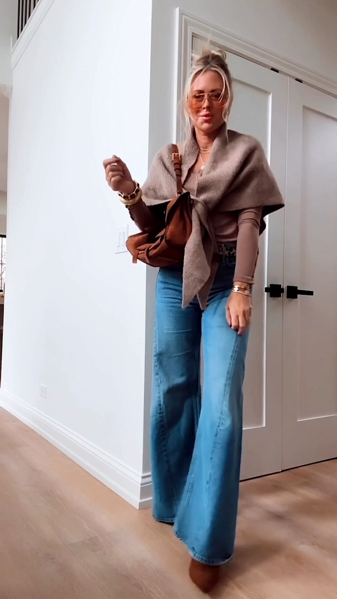 🍂🤎 best $25 you’ll spend is on this wrap! 
Great for game day too! 

Jeans. Fall style. Fall outfit. Shawl. Amazon wrap.

#LTKootd #LTKSeasonal