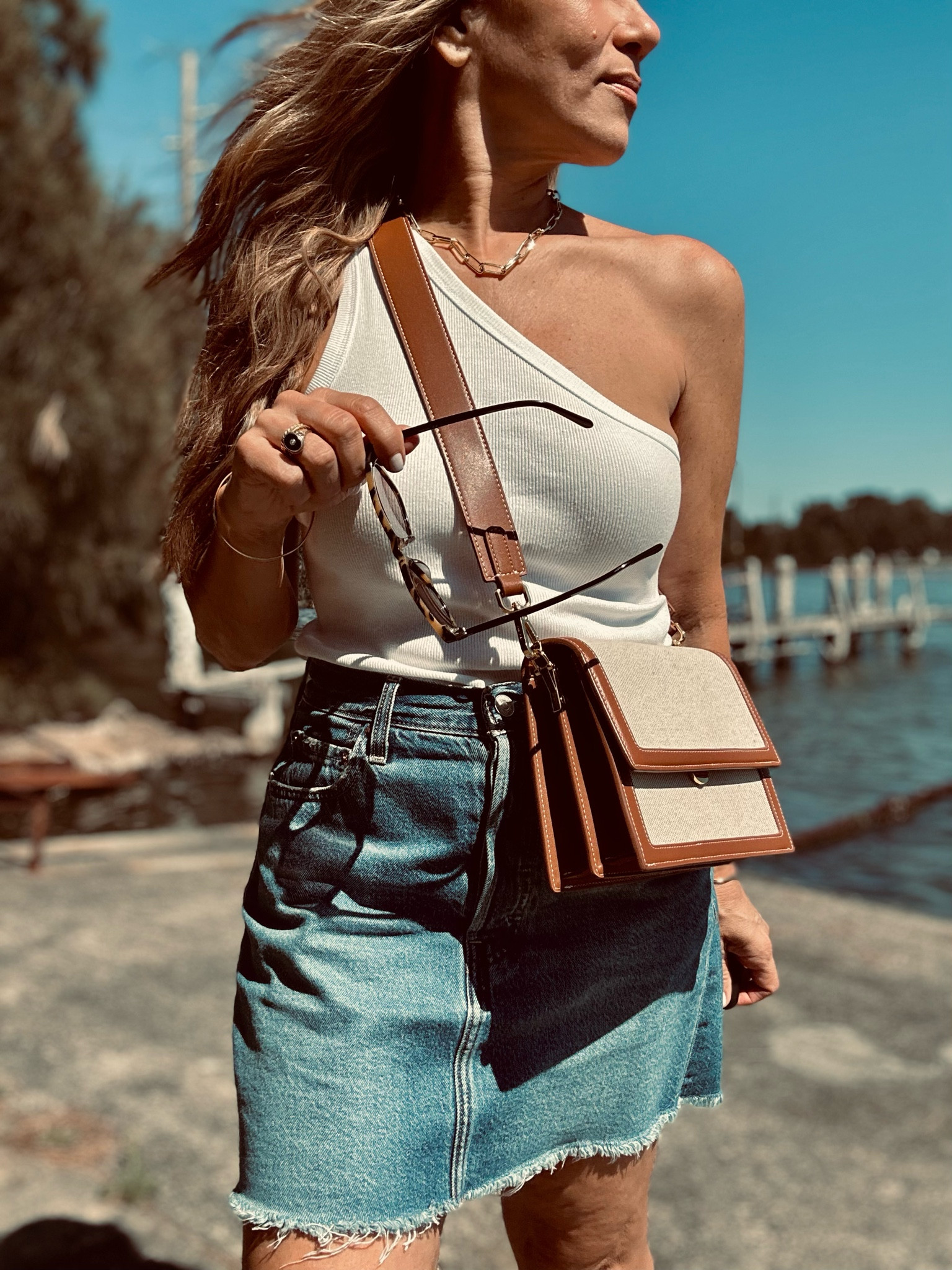 This bag from JW Pei is set to be my go-to crossbody bag this summer. I just love the vibe and the warm tan colour is perfection! It looks and feels high end but it’s absolutely affordable! Looks great with both a simple or elevated outfit. Gorgeous! 🤎

Top - Anthropologie
Skirt - Levi’s 
Bag - JW Pei
Shades - Fossil
Necklace - Ana Luisa

#LTKitbag #LTKstyletip #LTKaustralia