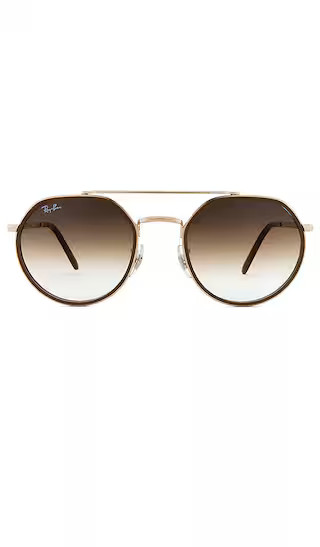 Round Sunglasses in Arista | Revolve Clothing (Global)