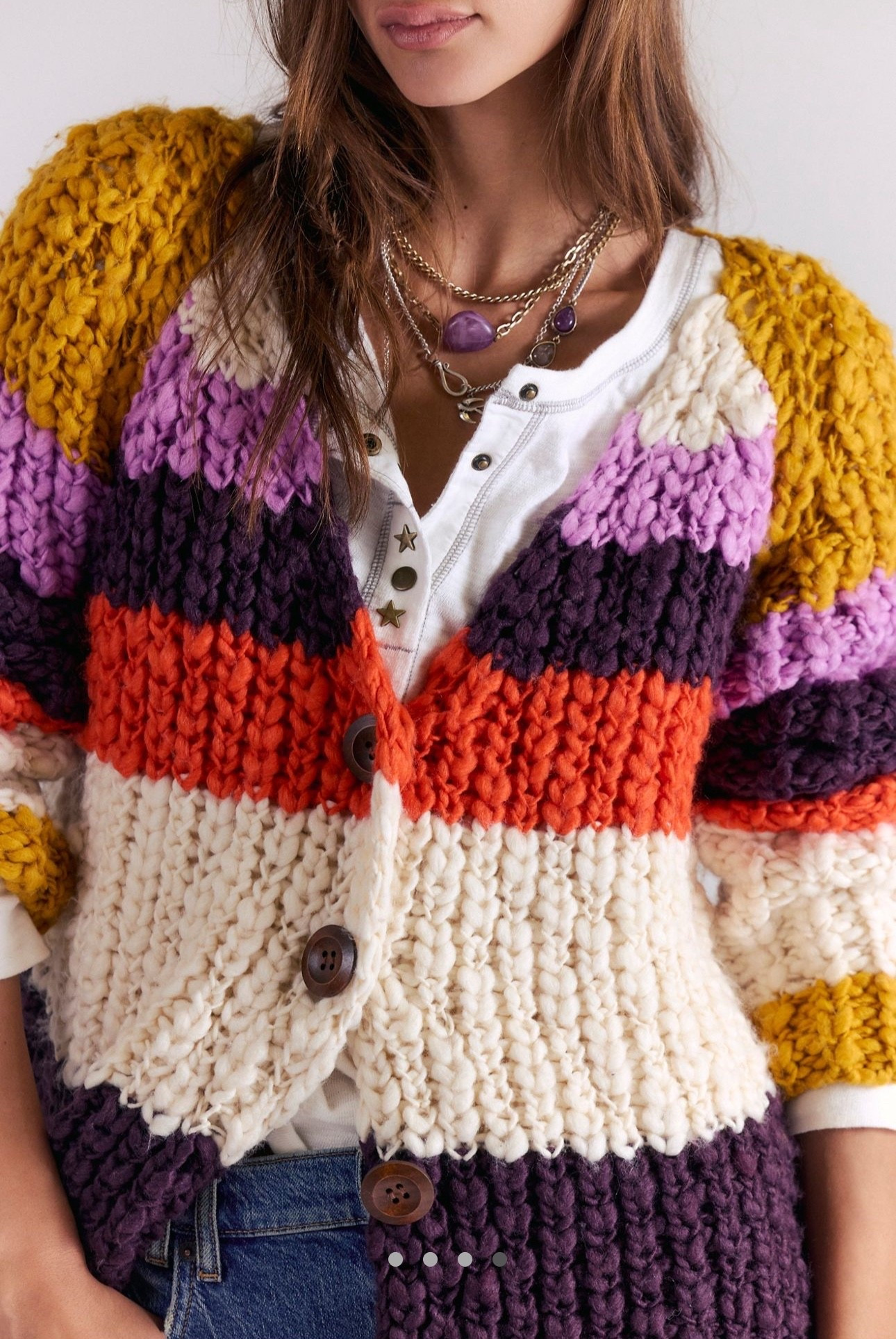 Free People must have striped cardigan! So cozy for year-round wear, this chunky knit cardi features a slouchy oversized fit, V-neckline, and a bold colorblocked pattern.

#LTKFindsUnder100 #LTKootd #LTKWorkwear