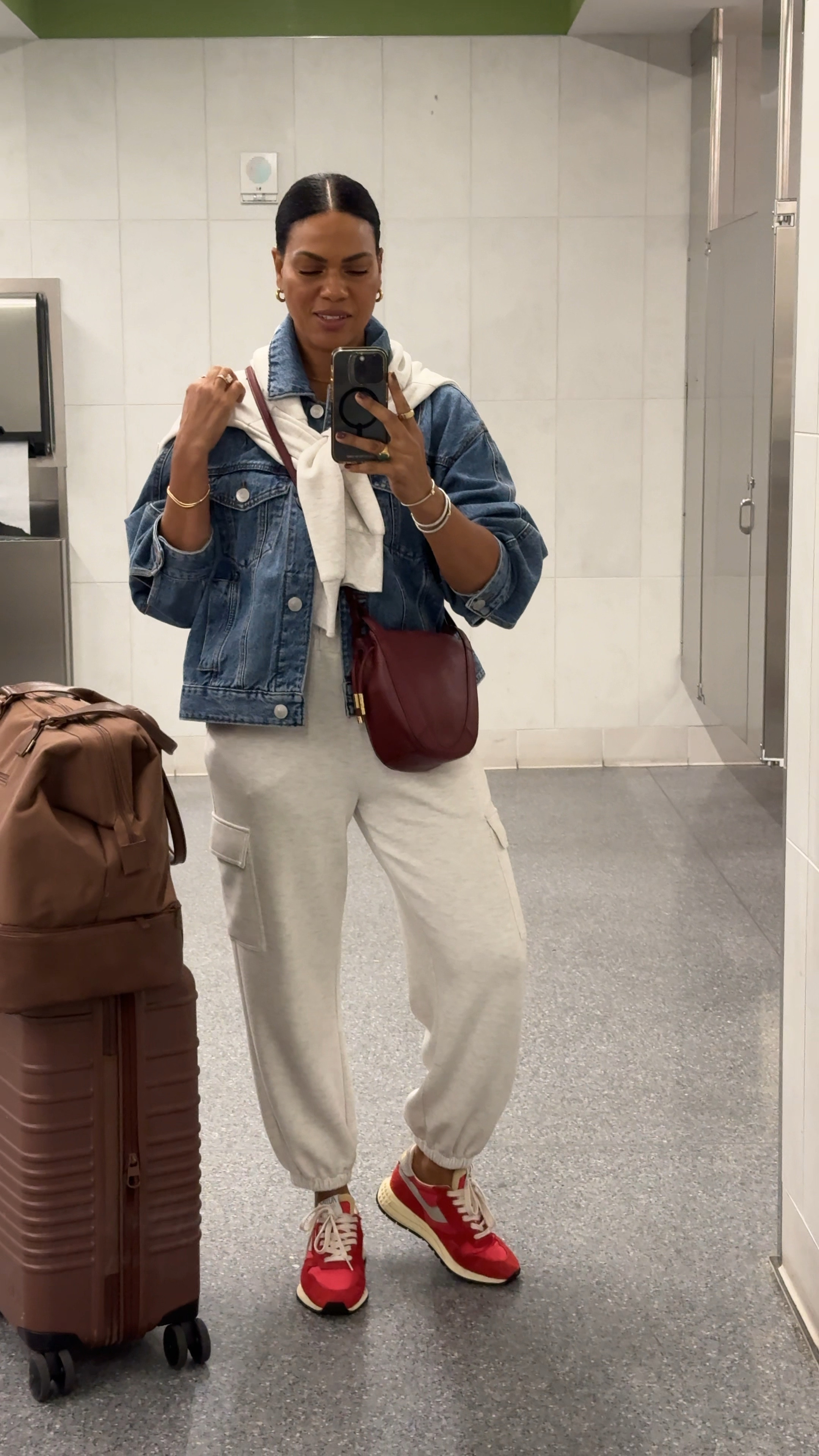 Travel outfit! Varley pants (I got the shorter length- I’m 5’4”) and zip pullover, target denim jacket, autry sneakers (size up) Ulla Johnson bag that I got last fall.  Polished yet comfy! 

#LTKTravel #LTKNYFW #LTKOver40