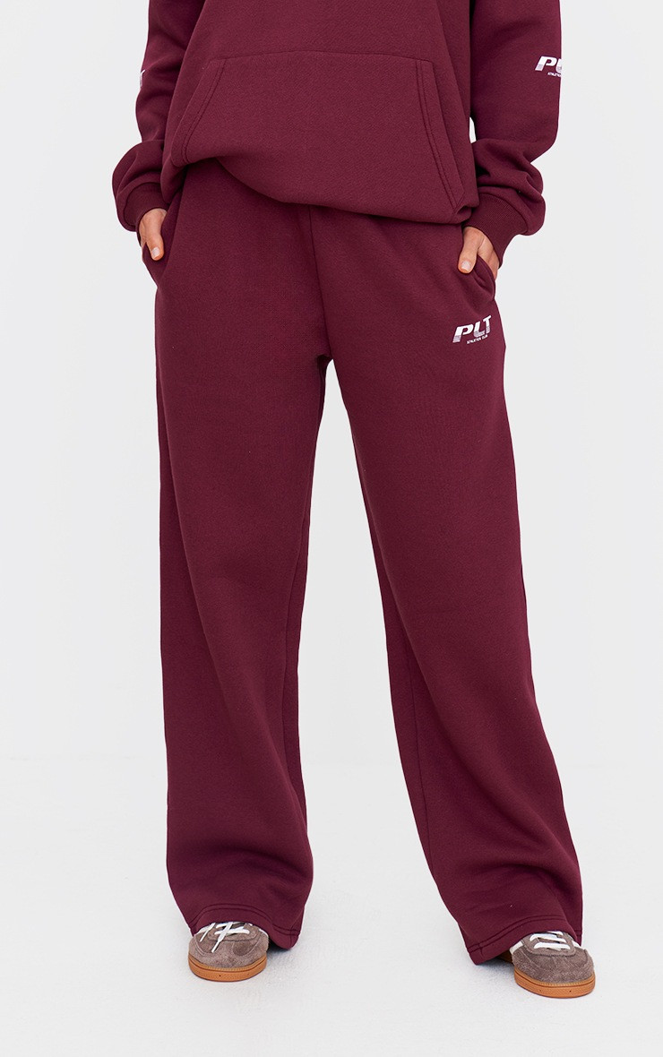 PRETTYLITTLETHING Tall Burgundy Logo Printed Wide Leg Sweatpants | PrettyLittleThing US